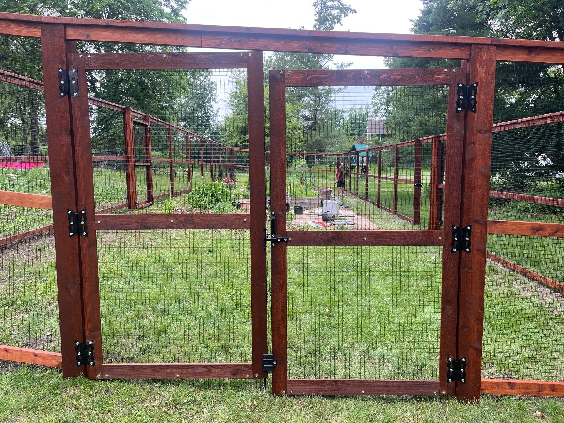 Stained Cedar Mahogany Garden Fence and Raised Bed Enclosure in Cedar Falls by Perfect Picket Fence and Stain