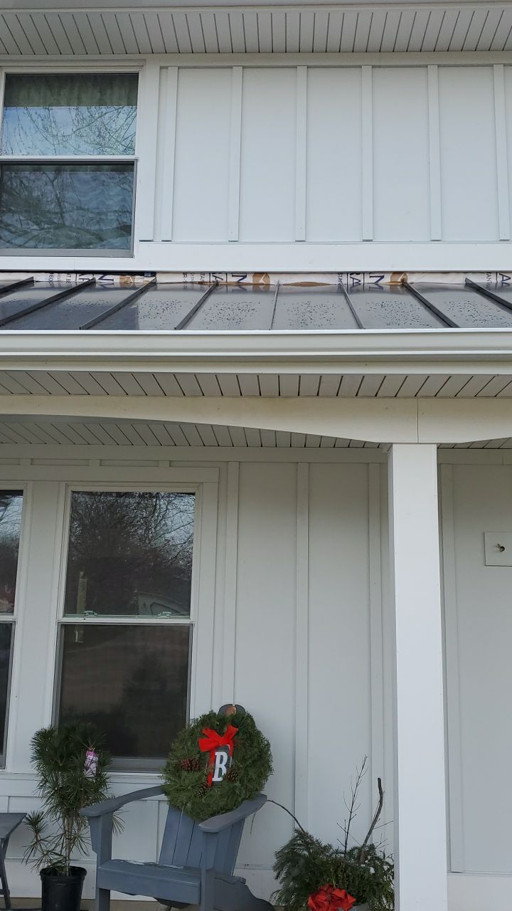 James Hardie Siding  using James Hardie Board and Batten, White by Absolute Roofing and Construction