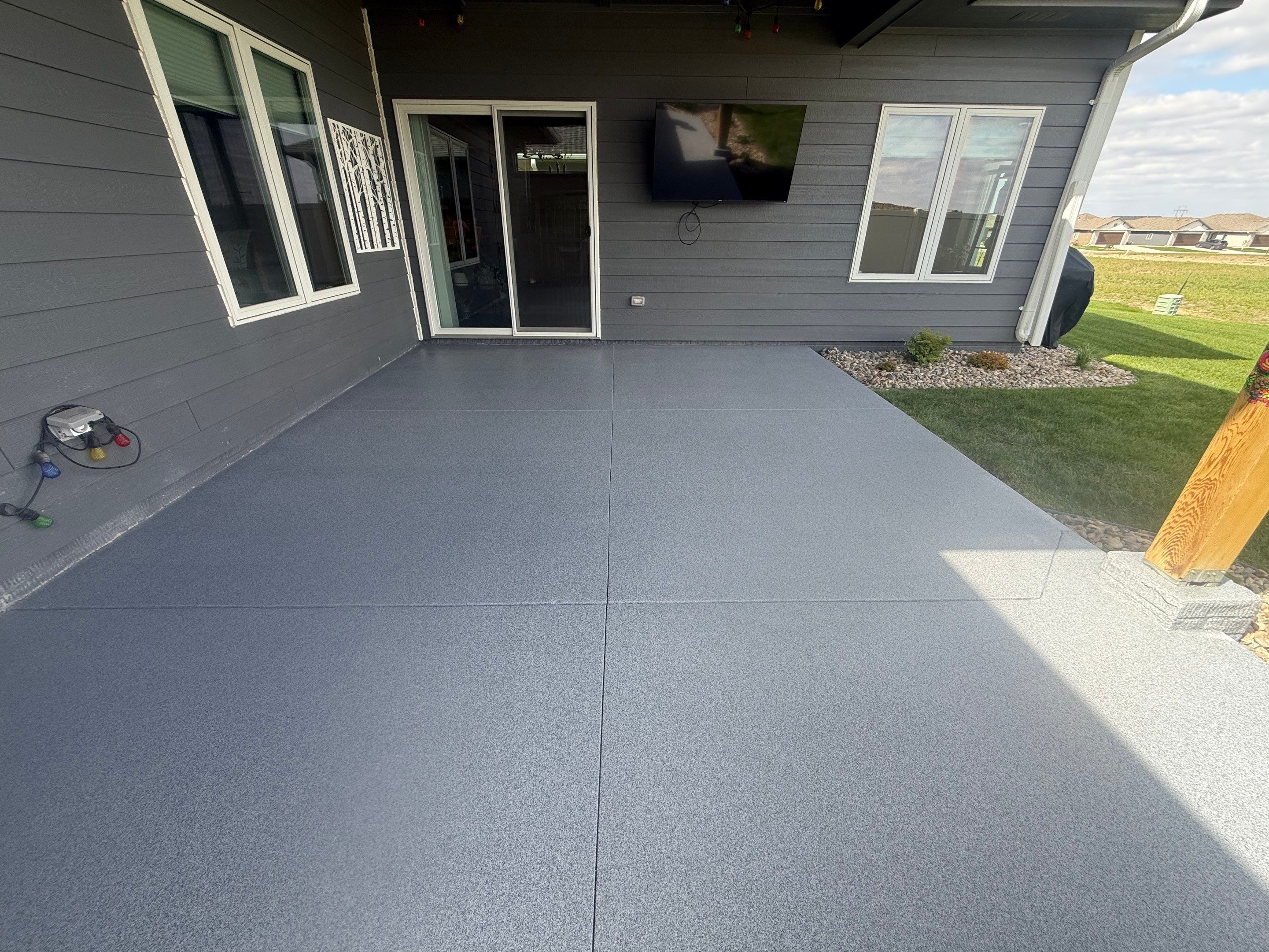 Decorative Flake Concrete Coating for Sioux Falls Porch and Patio by Select Painting, Coatings & Garage Cabinets