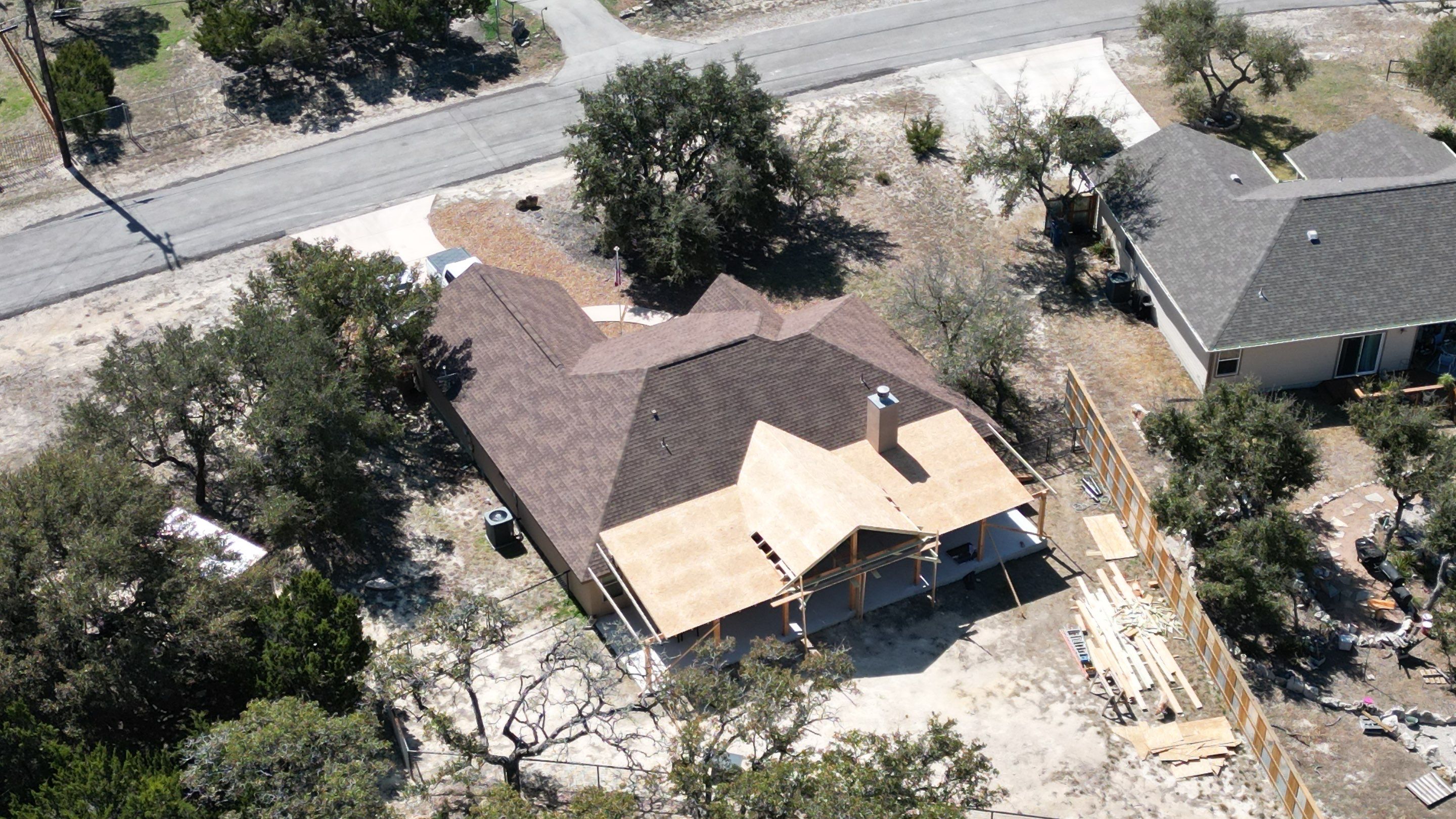 Reroof with Back Patio Addition using Owens Corning Duration Aged Copper by Lightning Exteriors