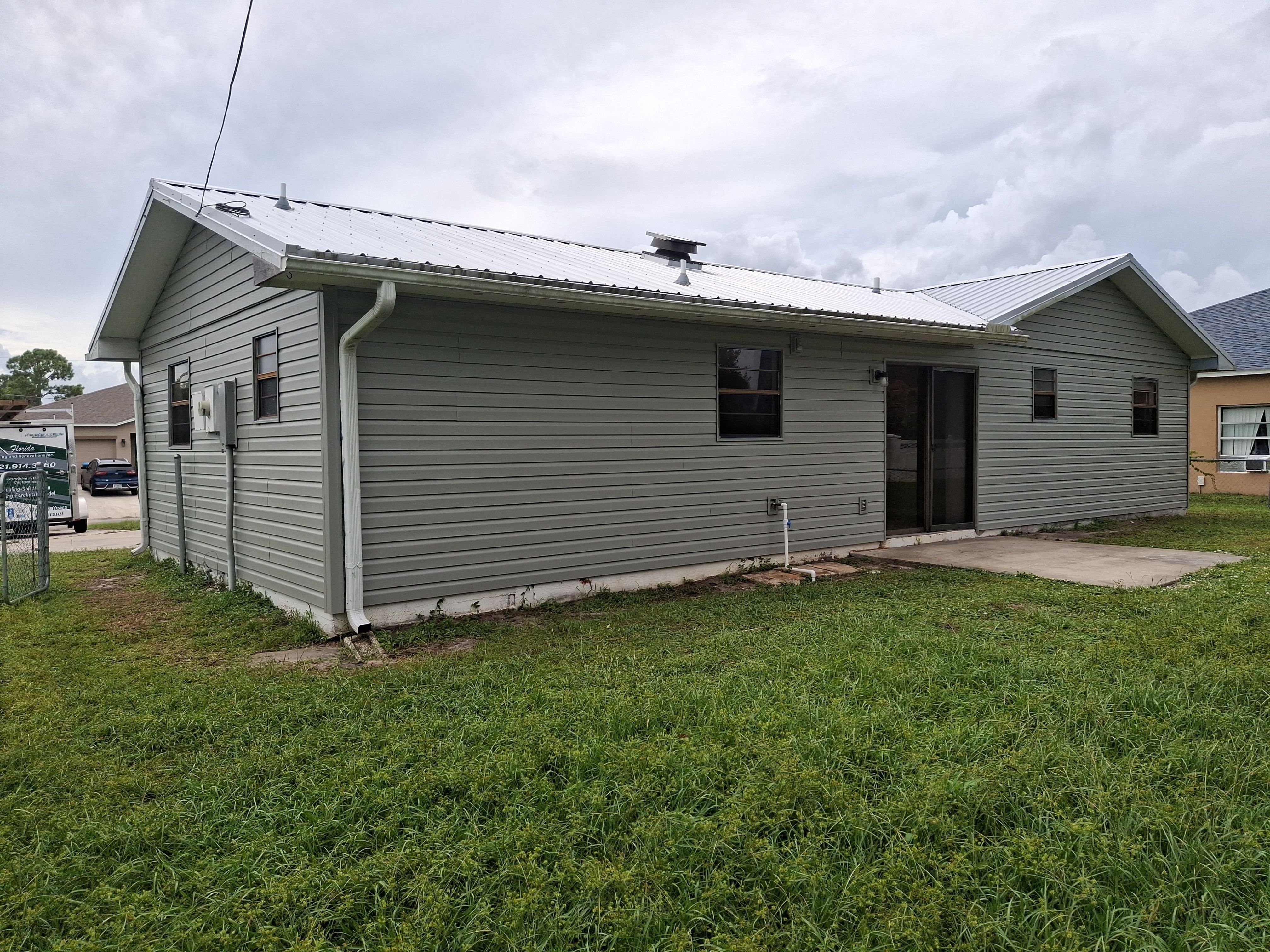 Vinyl Siding Installation and Structural Wood Rot Repair in Palm Bay by Florida Roofing and Renovations Inc.