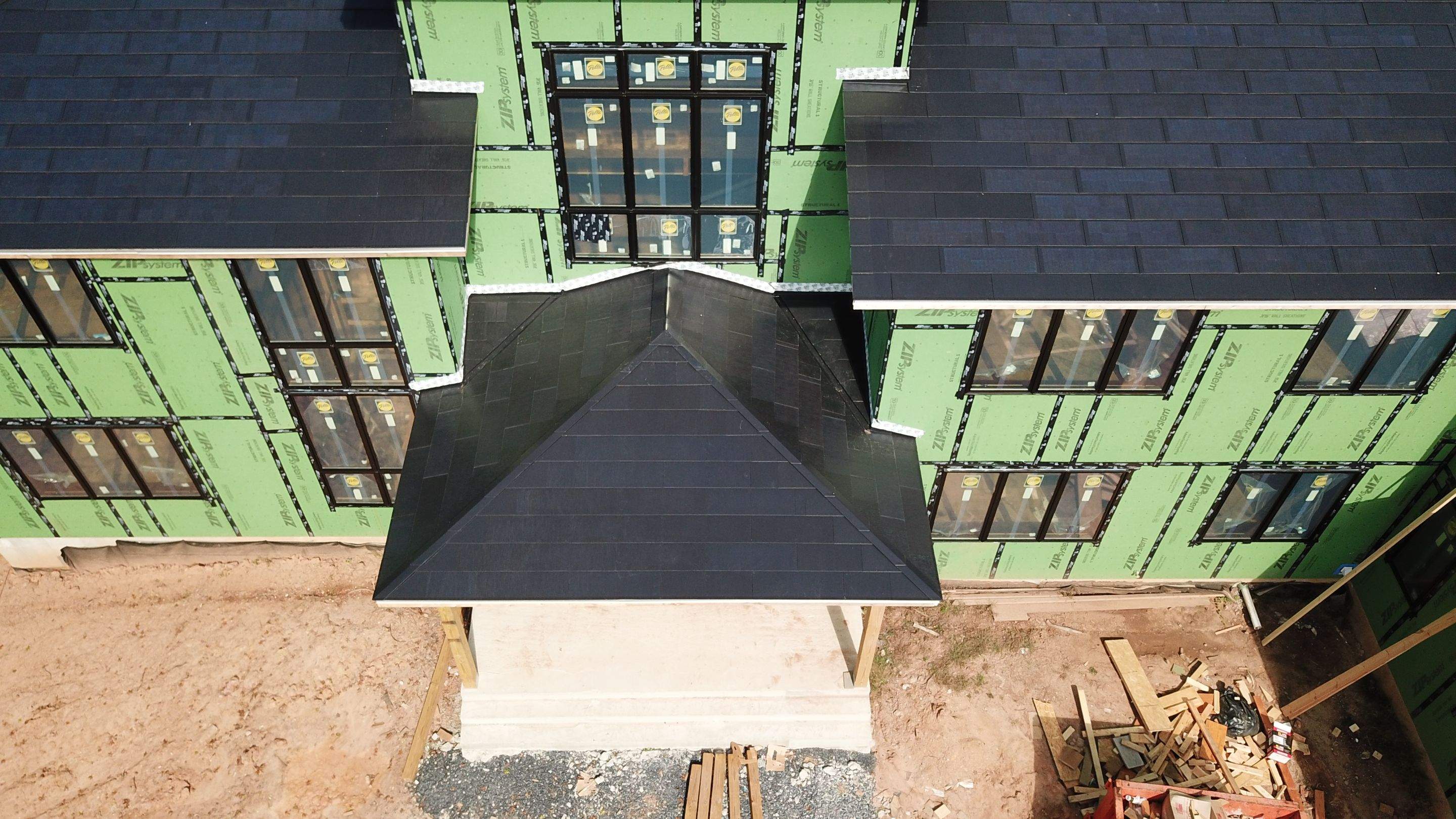 Tesla Solar Roof  using Tesla Solar Roof V3 tiles by American Home Contractors
