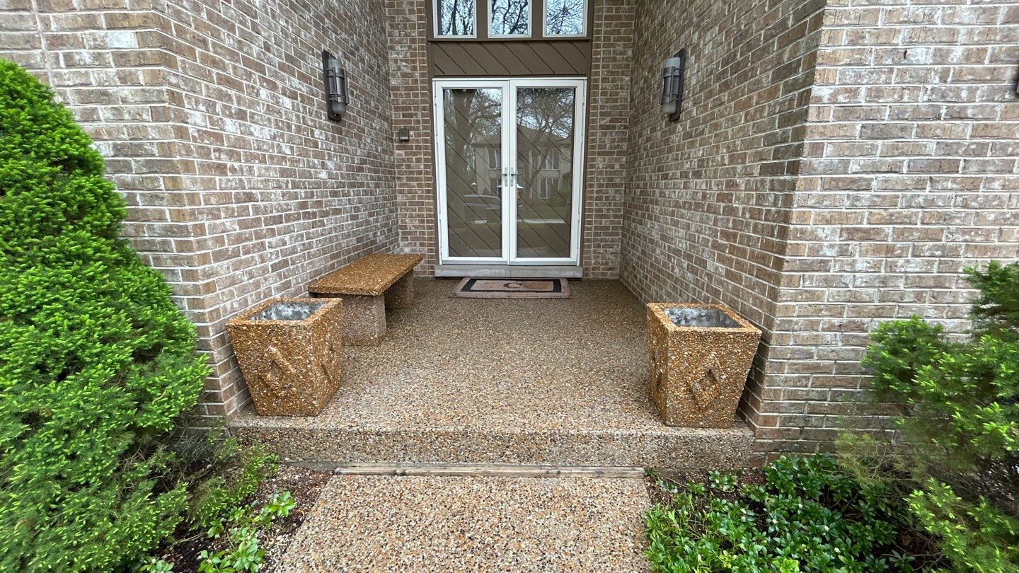 concrete patio and driveway cleaning by Northern Power Washing LLC.