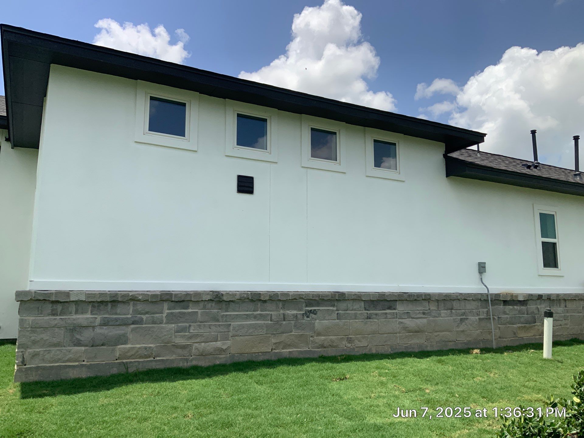Waller Sophistication: Snowbound Color Stucco with Limestone Accents. by Apex Conventional Stucco Llc