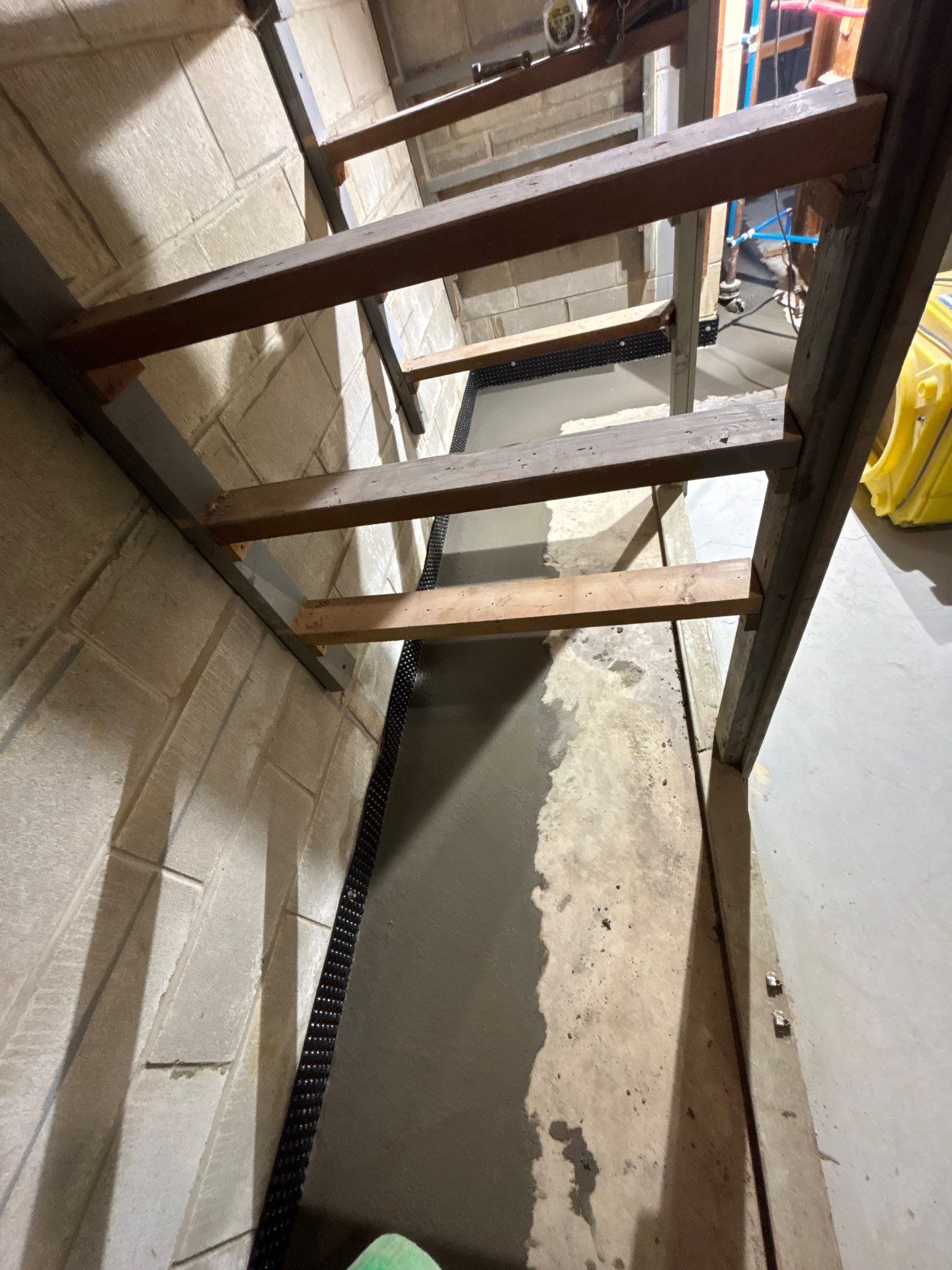 Drain Tile, Sump Pump & Buried Discharge in Columbia Heights by Waterproofing Northeast