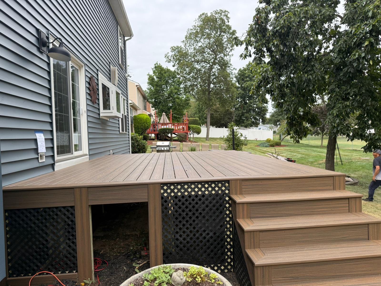 Deck resurface with Trex and cable rails by deck guardian
