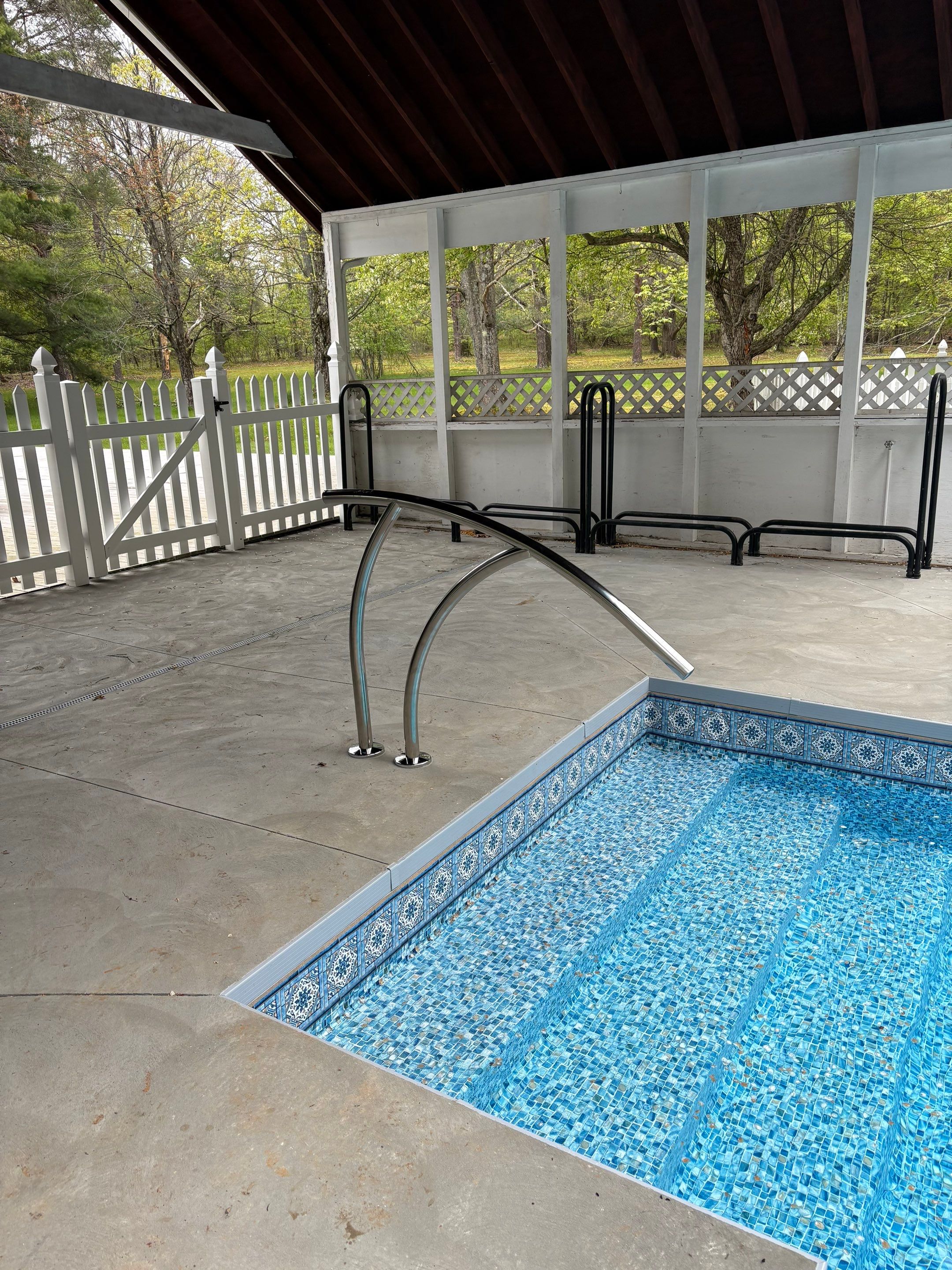 In-Ground Swimming Pool Renovation and Concrete Decking in Old Chatham by Cypress Pools and Spas