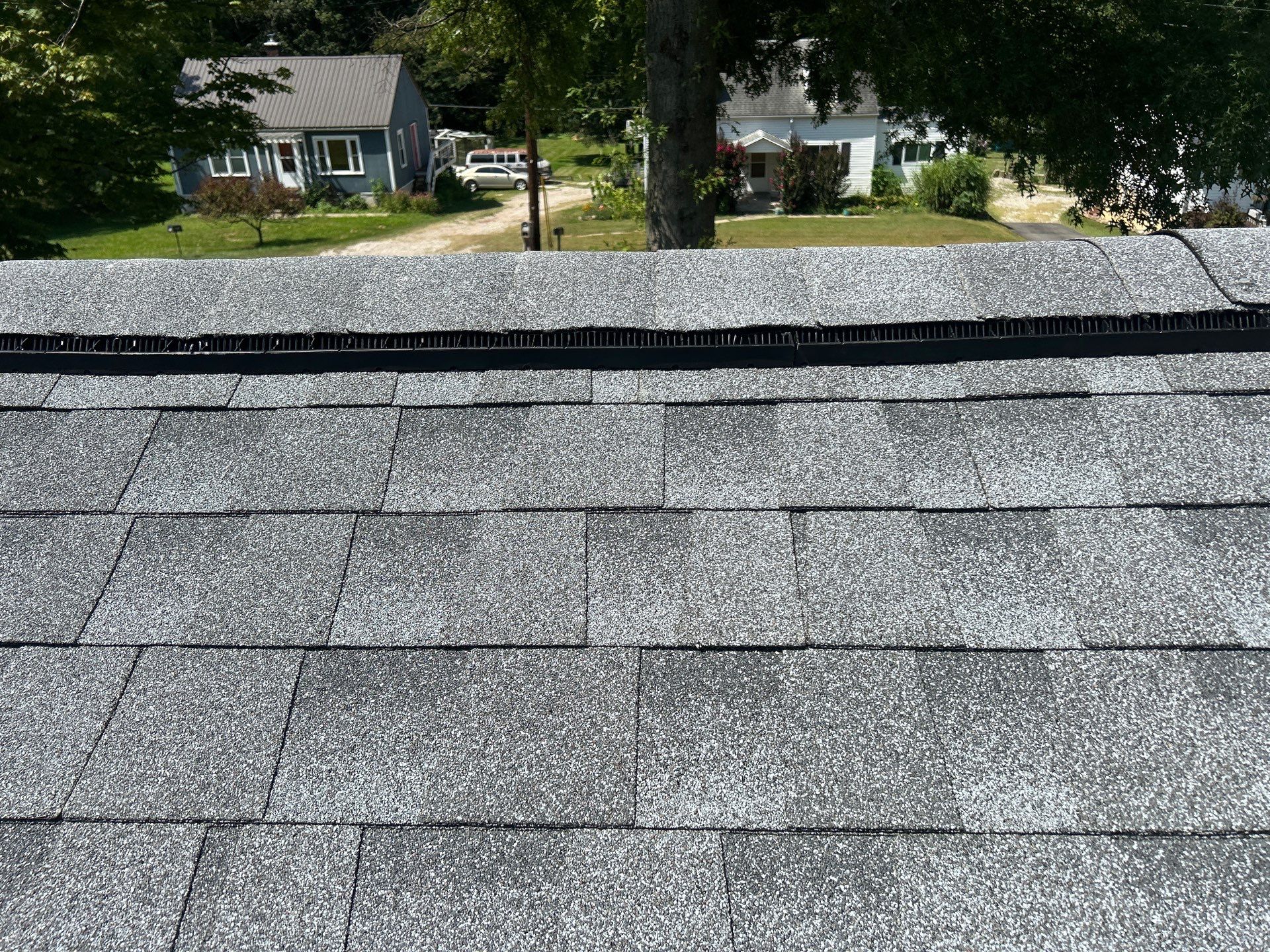 Residential Roofing Installation using GAF Timberline HDZ Oyster Grey by Rainstoppers Roofing
