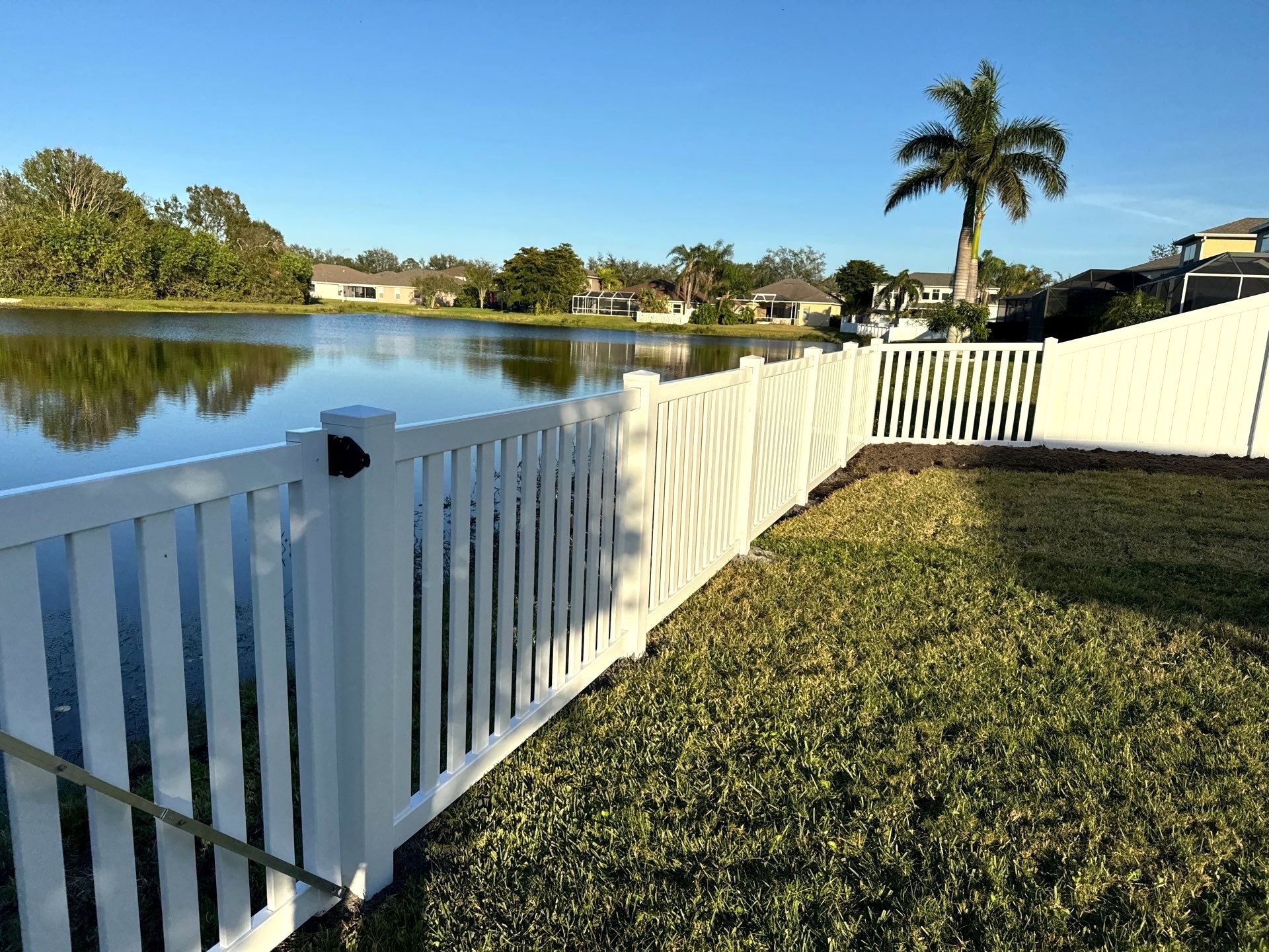 Vinyl Picket Fence Installation using 6Ft White Vinyl Privacy Fence with a 4Ft White Clearwater Picket Fence by Asap fence and gates, LLC