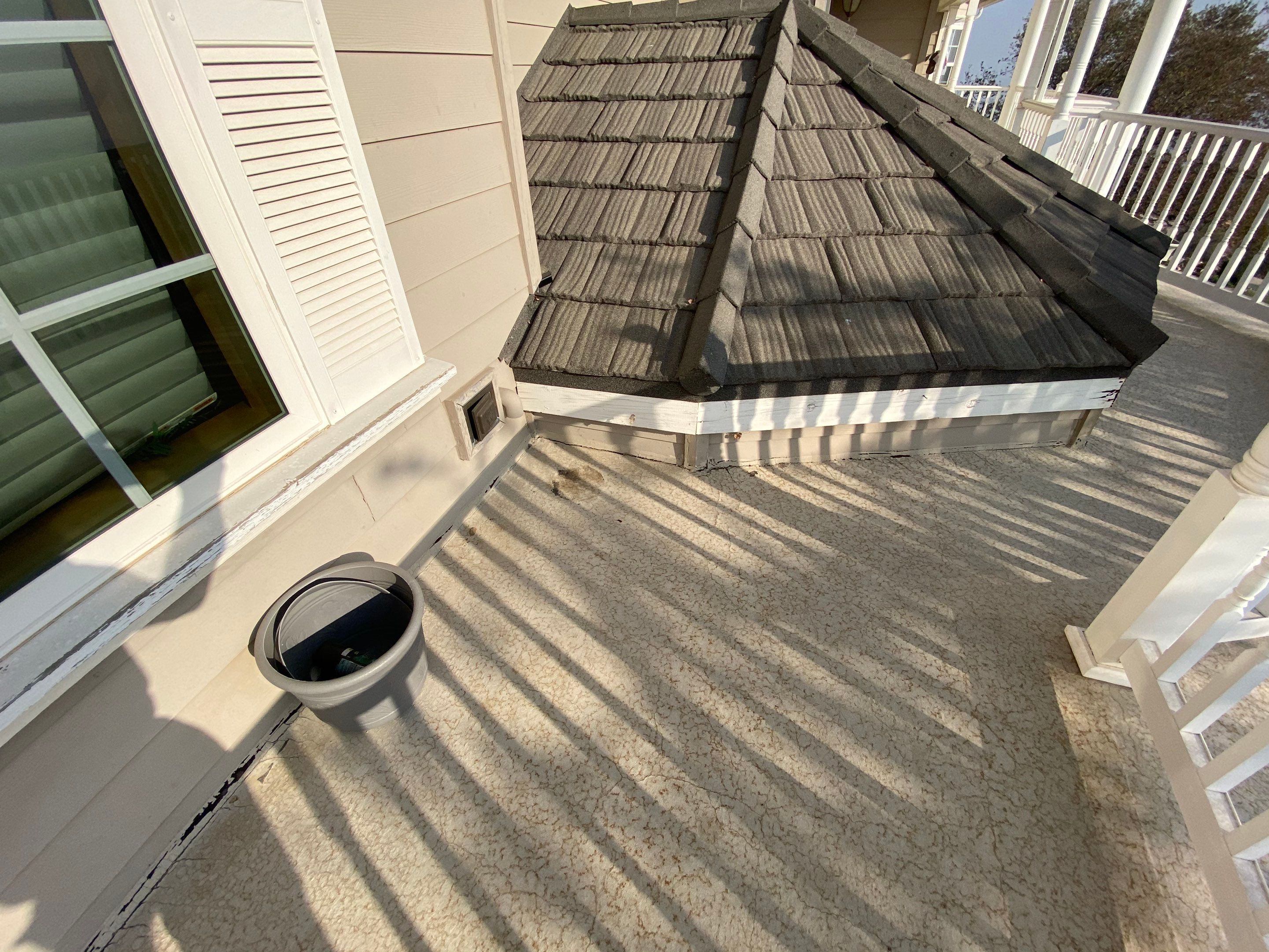 Sealant system over walk deck over house using Rubber coat and coatings by Straight Edge Roofing Inc