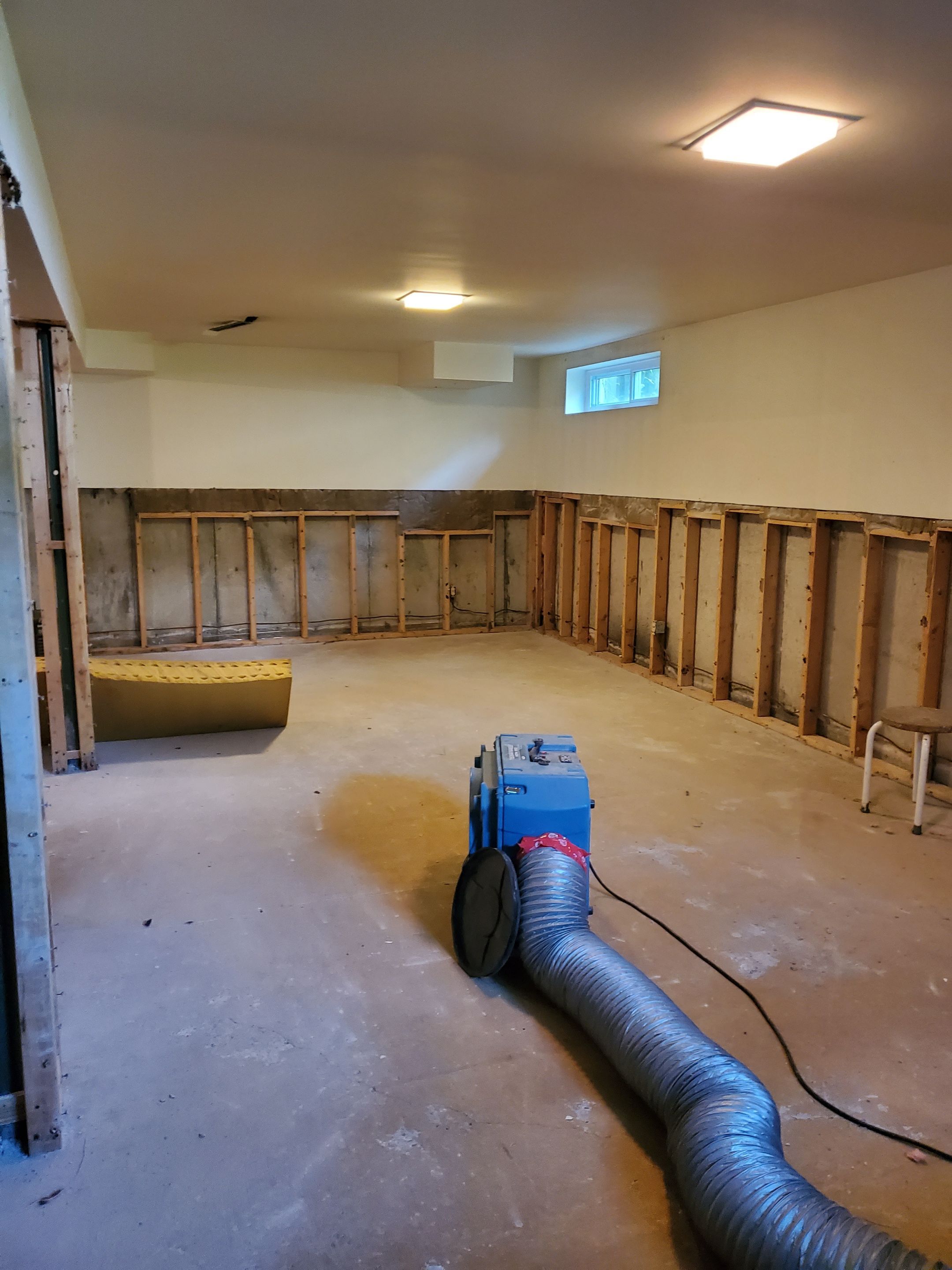 Basement rebuilt after flood by Eco-Nature Construction Inc.