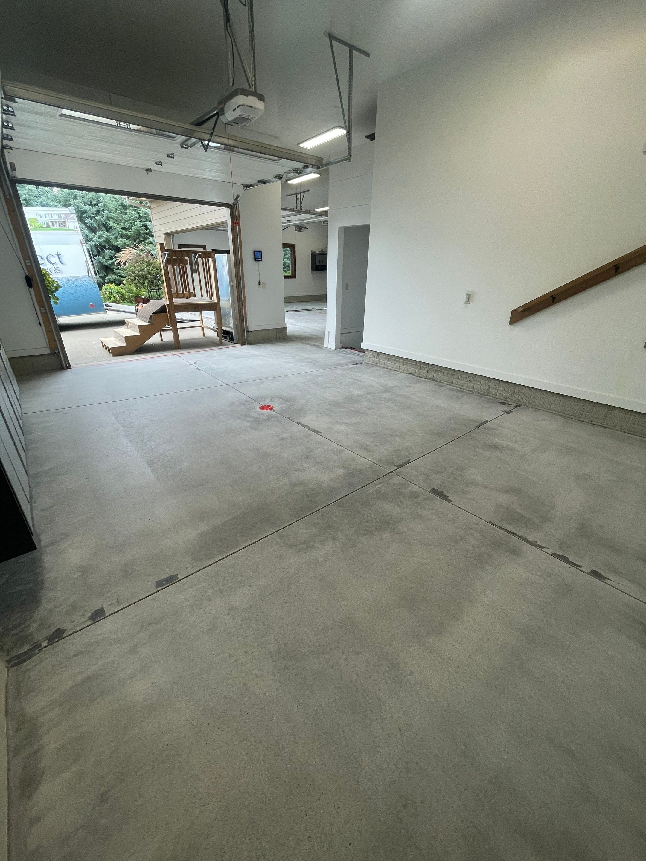 Garage Floor Coating and Domino Flake Finish in Sioux Falls by Select Painting, Coatings & Garage Cabinets