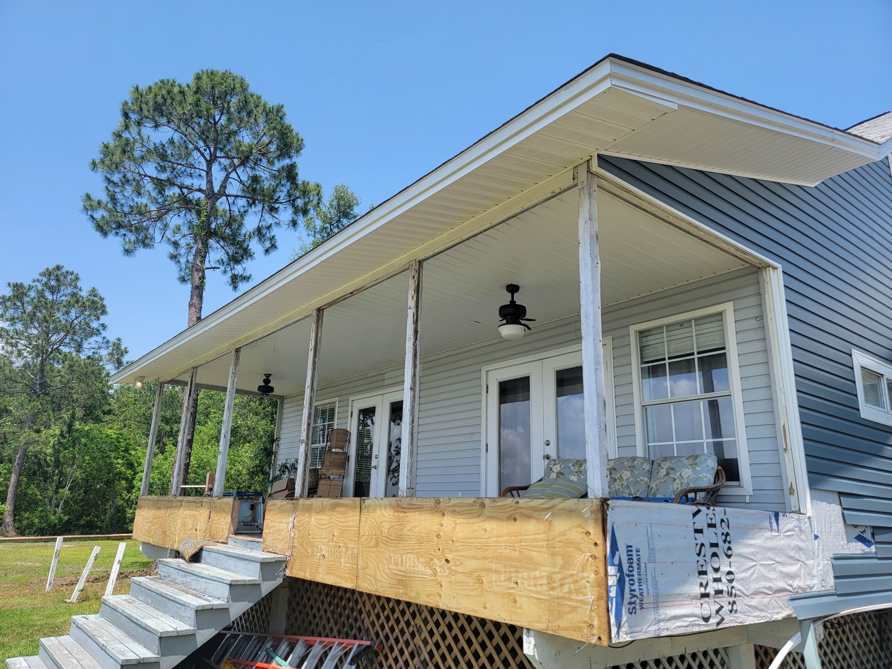 Glass Under w/Stairs in Milton by Titan Sunrooms