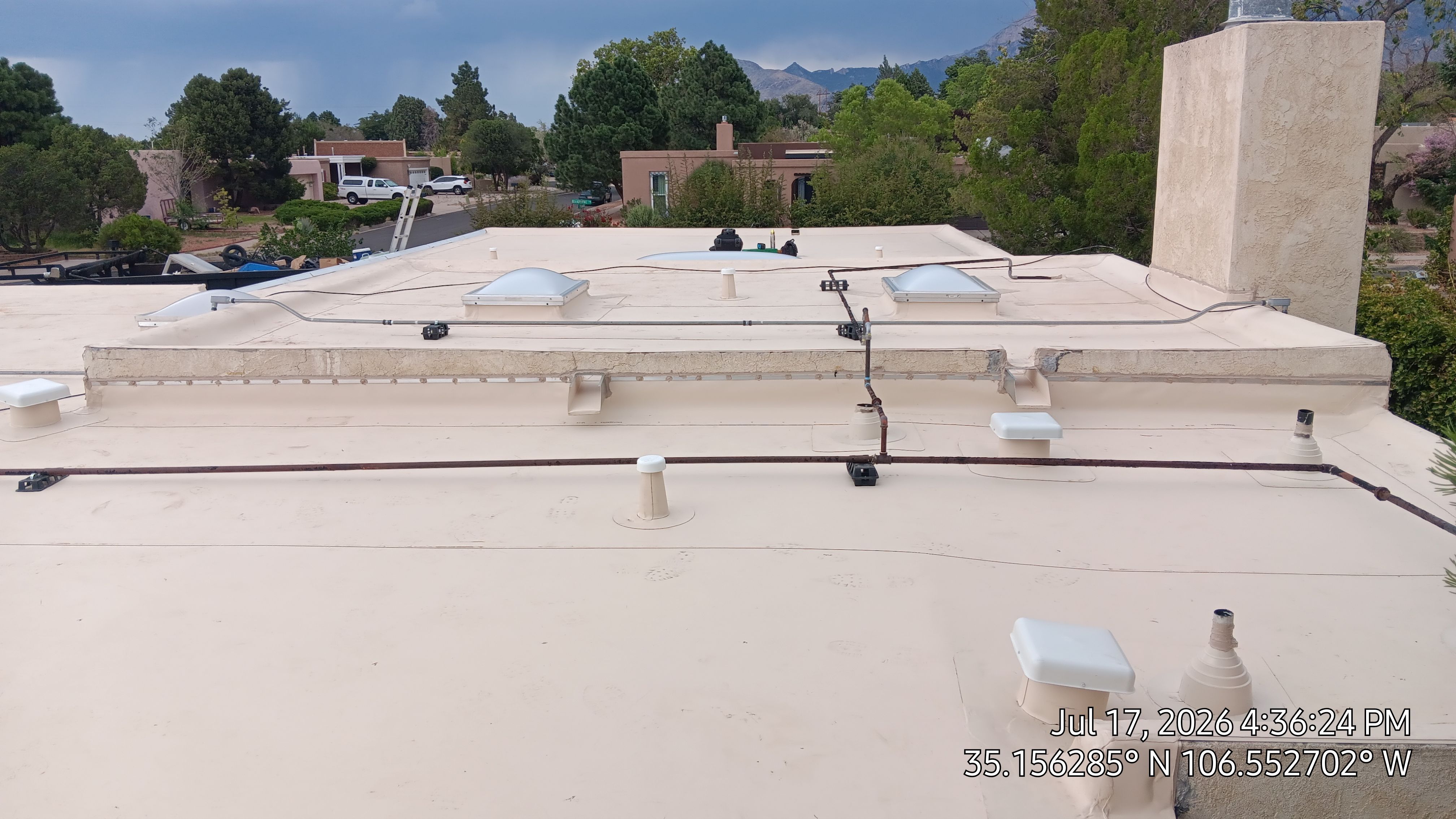 Albuquerque TPO Roof Replacement in the Northeast Heights EPS Slope and Custom Skylights by Doyle Roof Masters Inc
