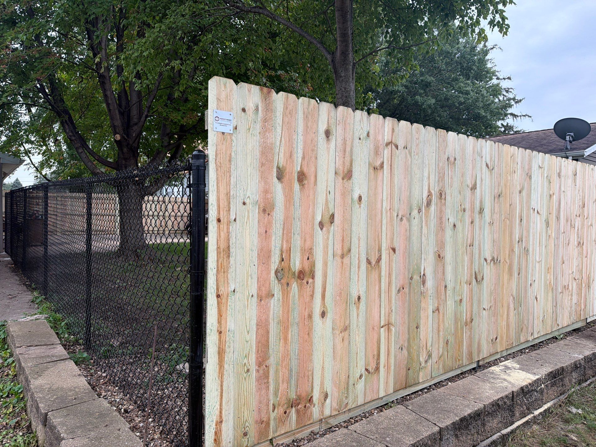 Custom Wood Privacy and Black Chain Link Fence in Hudson by Perfect Picket Fence and Stain
