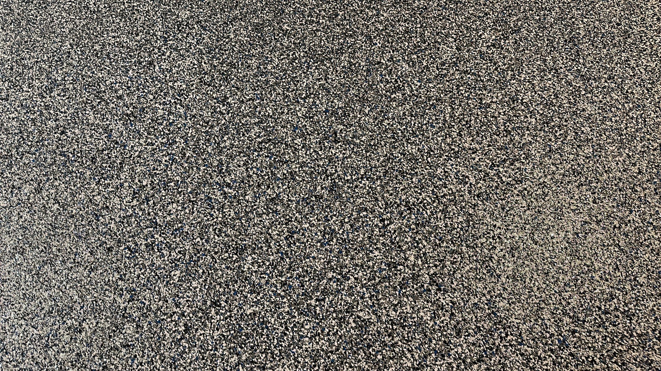 A beautiful Banner Garage Coating in a basement  by Banner Garage