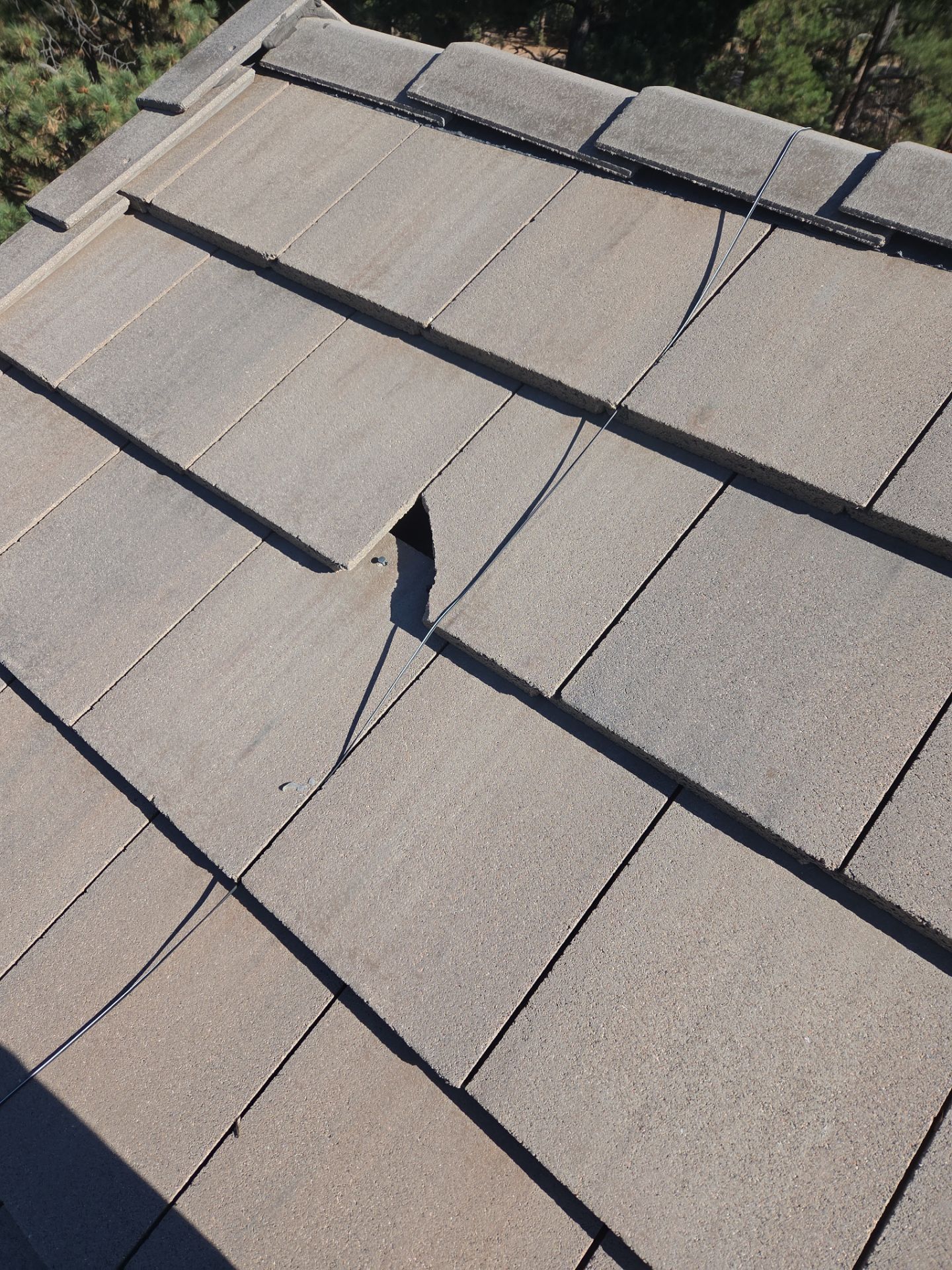 Broken Tile Replacement by RTP Roofing Company