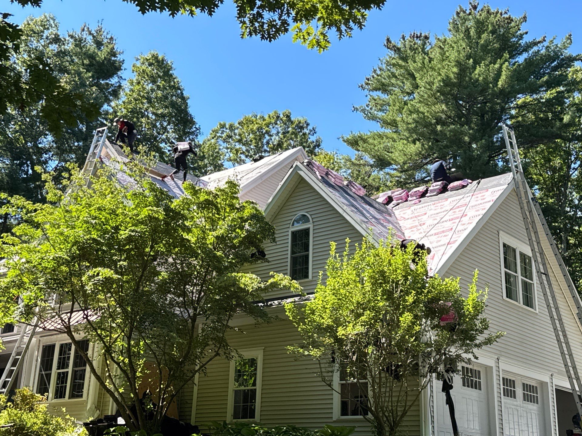 Asphalt Roof Replacement in Brentwood, NH | Owens Corning Roofing & Velux Skylights by Compass exteriors
