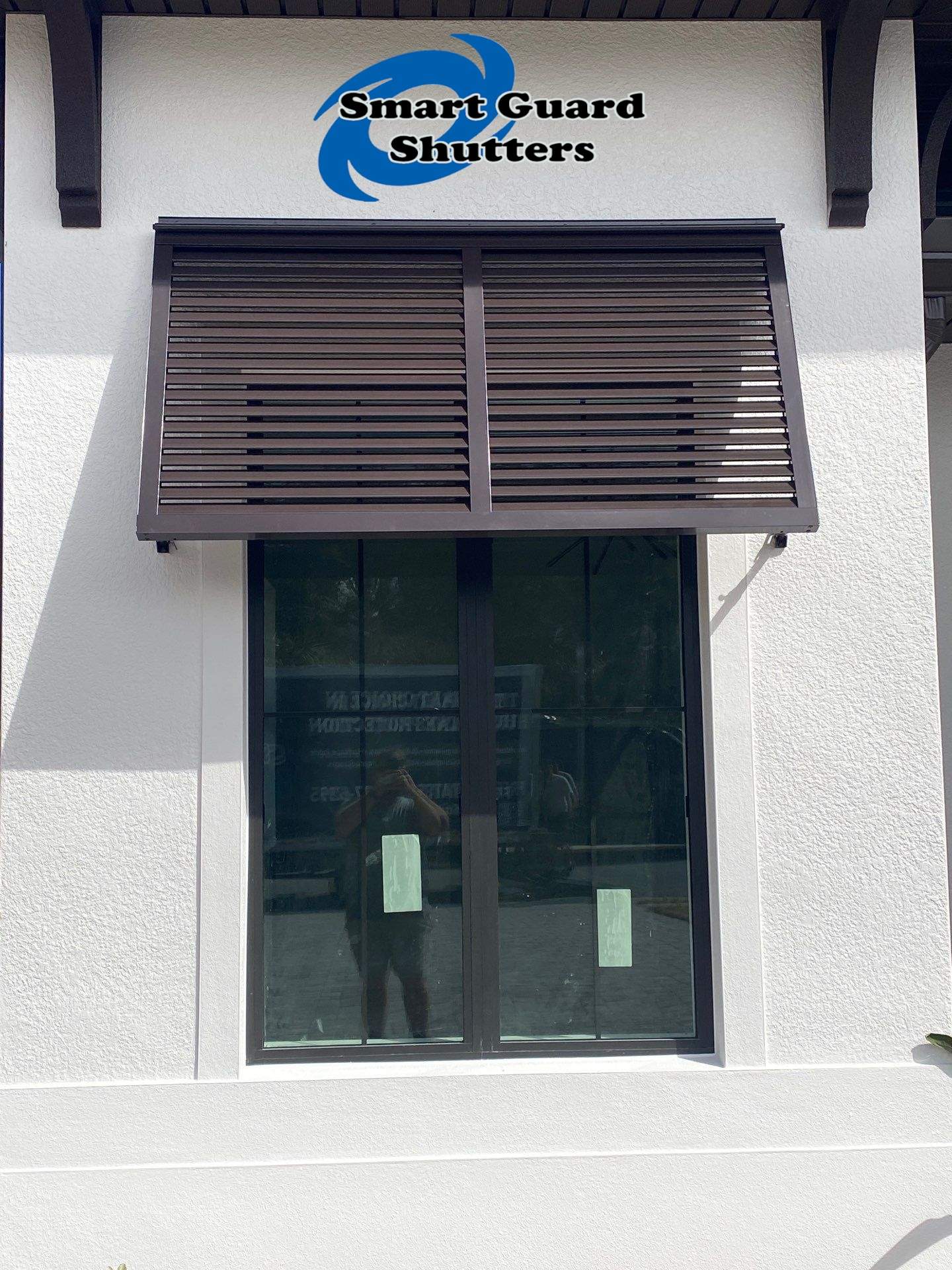 Decorative Bahamas in Grey Brown by Smart Guard Shutters
