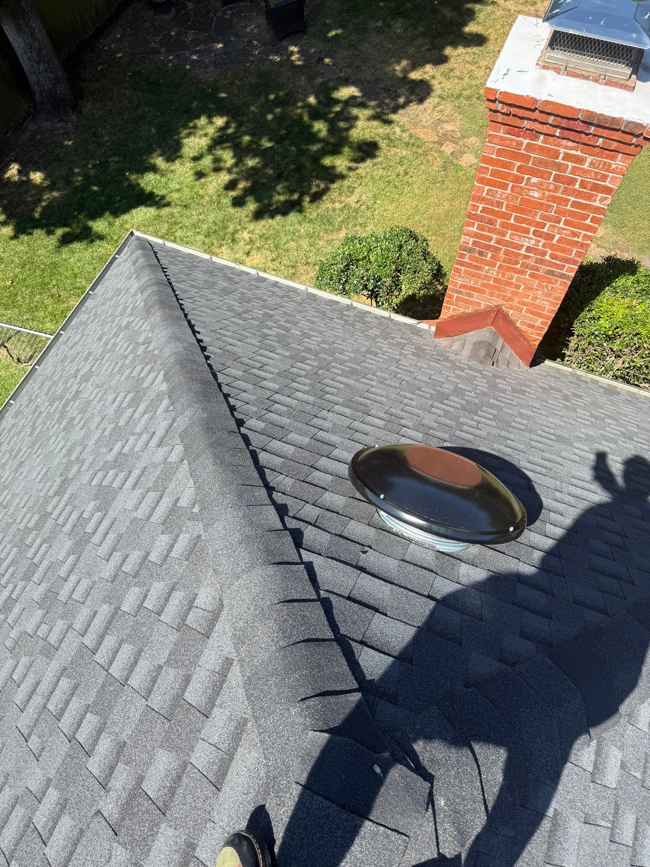 roof replacement & skylight repair in Edmond by McCann's Roofing and Construction