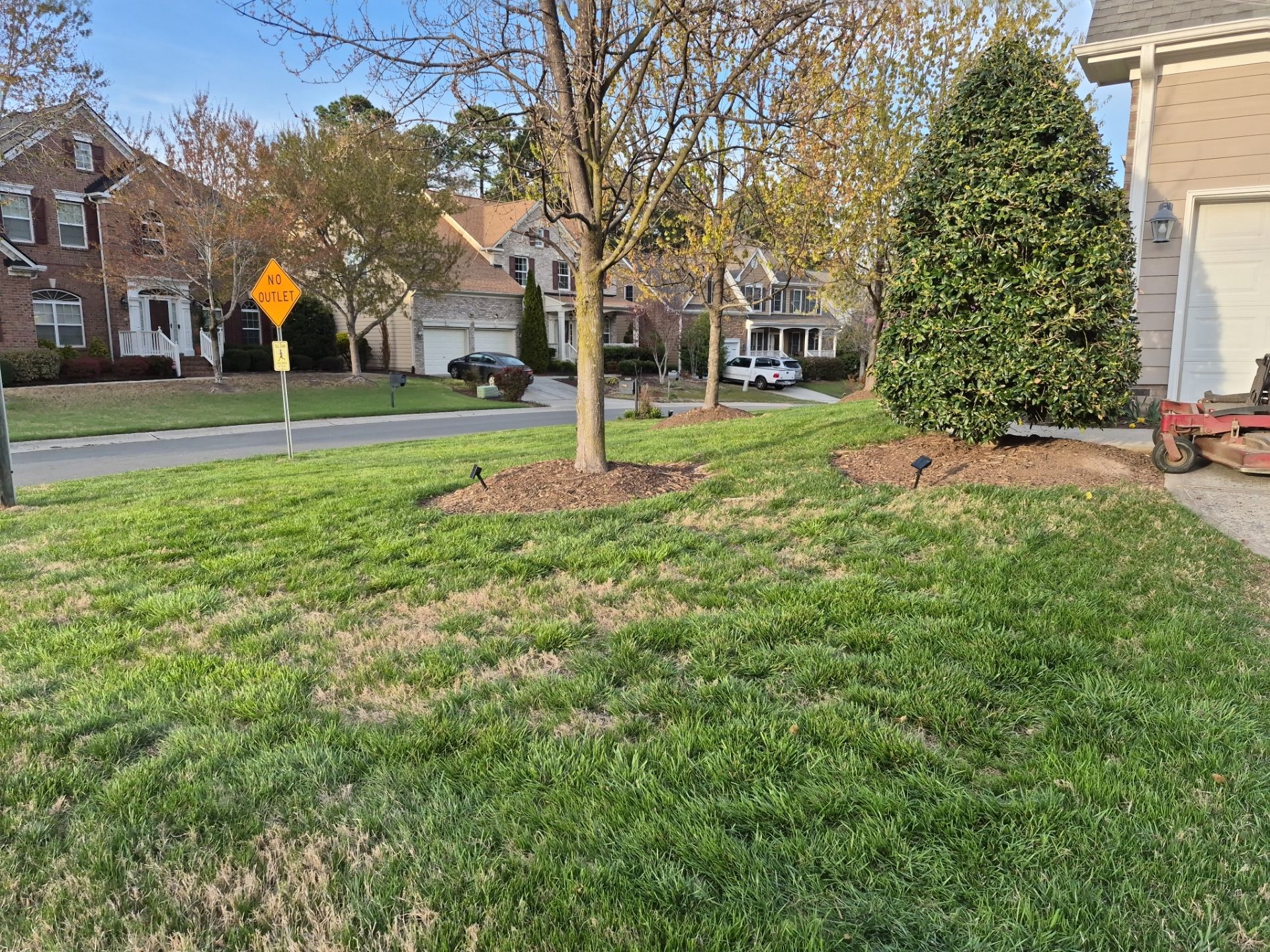 Fixing brown spots in grass in Durham by Martinez Brother’s Nc Landscaping Inc