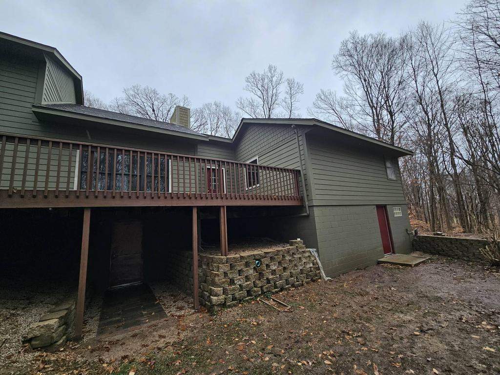 Siding Installation using Primed James Hardie & Straight Edge Shakes by Koontz Construction