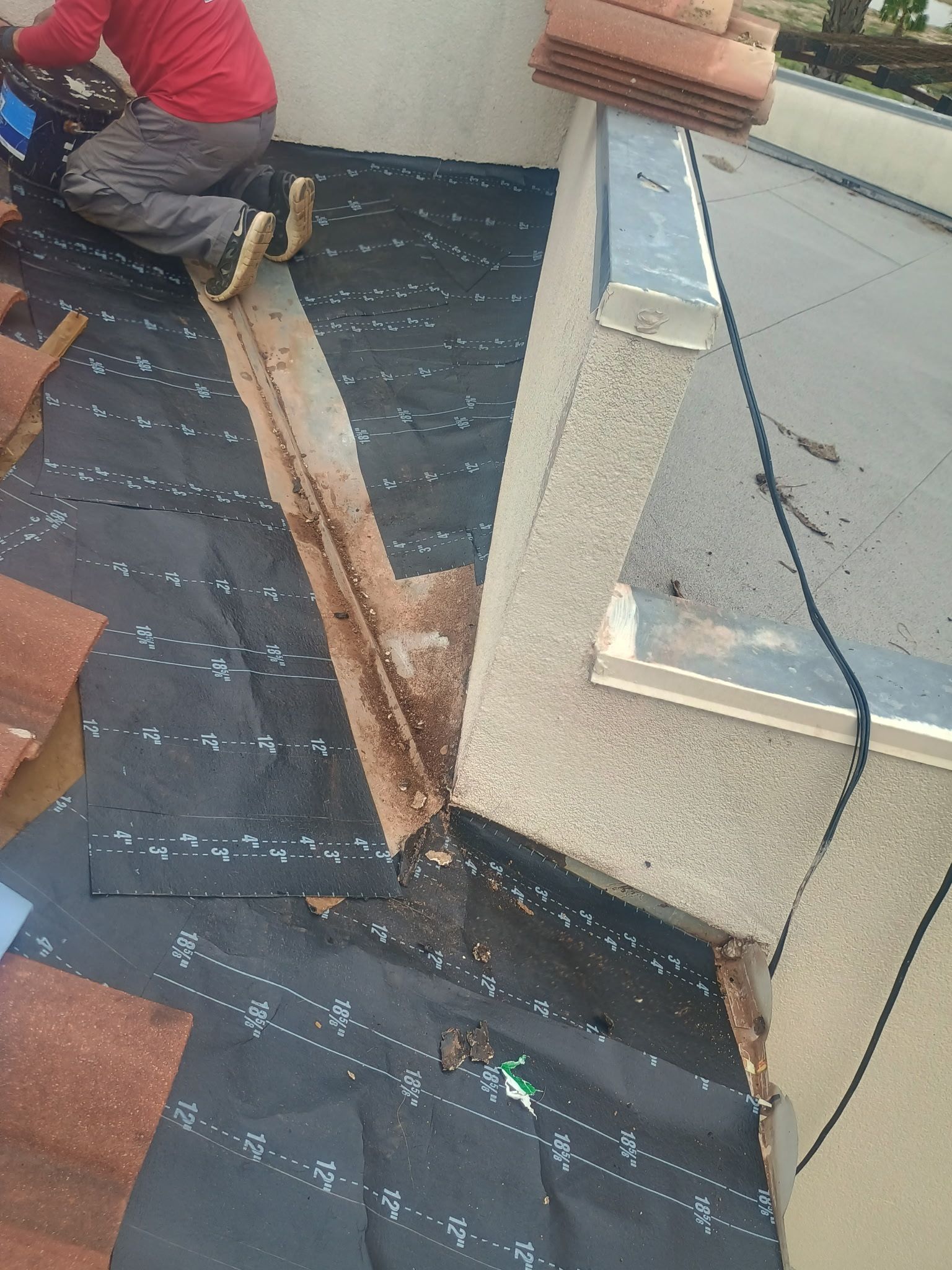 Residential Clay Tile and Flat Membrane Roof Repair in Laredo by JM Flores Roofing & Construction, Inc