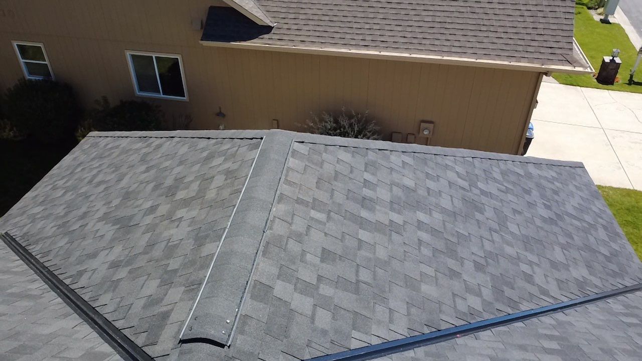 Full Residential Roof Replacement and Skylight Installation in E 54th Ln Spokane, WA 99223 The Alpine Premium System - Certainteed Landmark® PRO Shingle - Max Def Moiré Black. - Certainteed ShadowRidge - Certainteed SwiftStar - Certainteed RoofRunner - Vycor 40 Mils. Ice & Water Shield - Certainteed Ridge Ventilation Included - Priority Scheduling - 5-Star PREMIER SureStart PLUS Coverage - CertainTeed 50 Year Material Guarantee - CertainTeed Workmanship Guarantee: LIFETIME - CertainTeed Warranty Transfer Period: 30 Years by Alpine Roofing