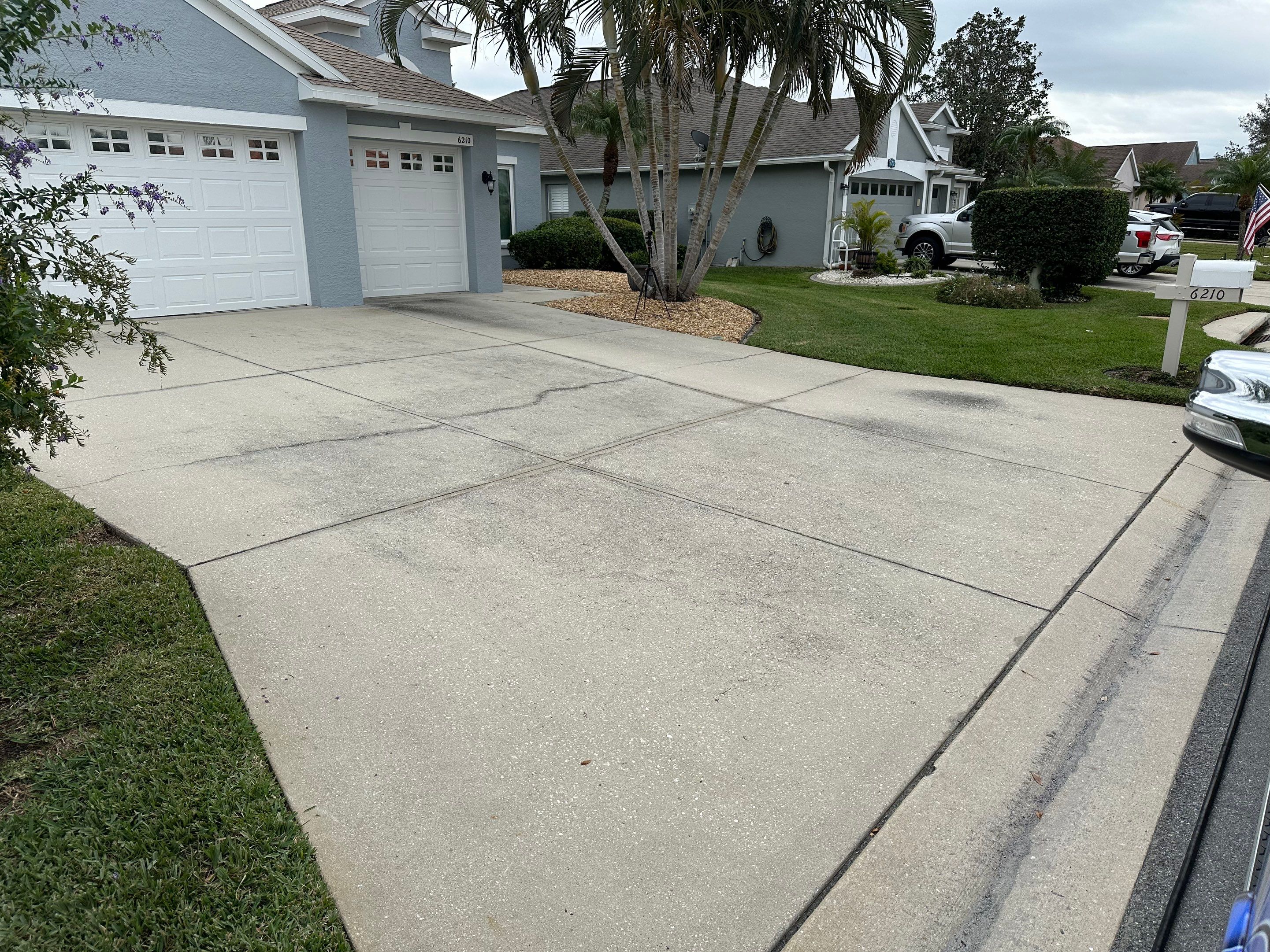 Concrete Driveway, Entryway & Street Curbing Cleaning in Fairways at Imperial Lakes, Palmetto, FL | Sunshine AquaWash by Sunshine AquaWash