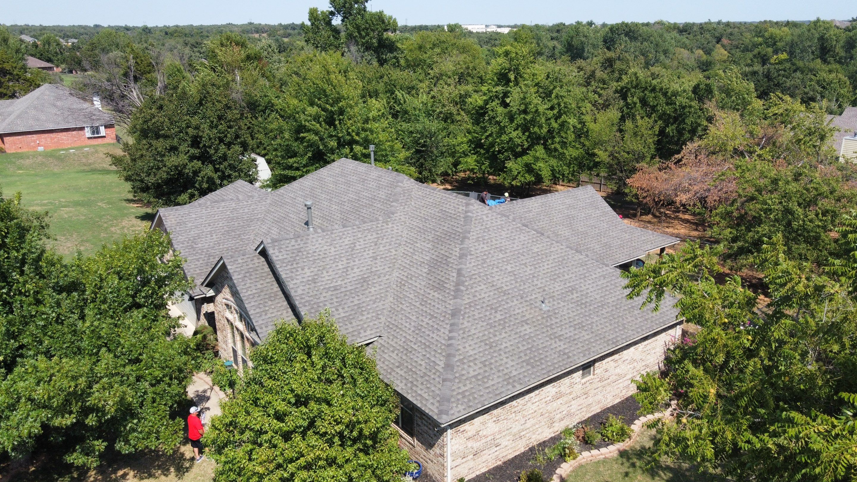 Residential Roofing Installation using GAF Natural Shadow  by A & H Roofing and Contracting
