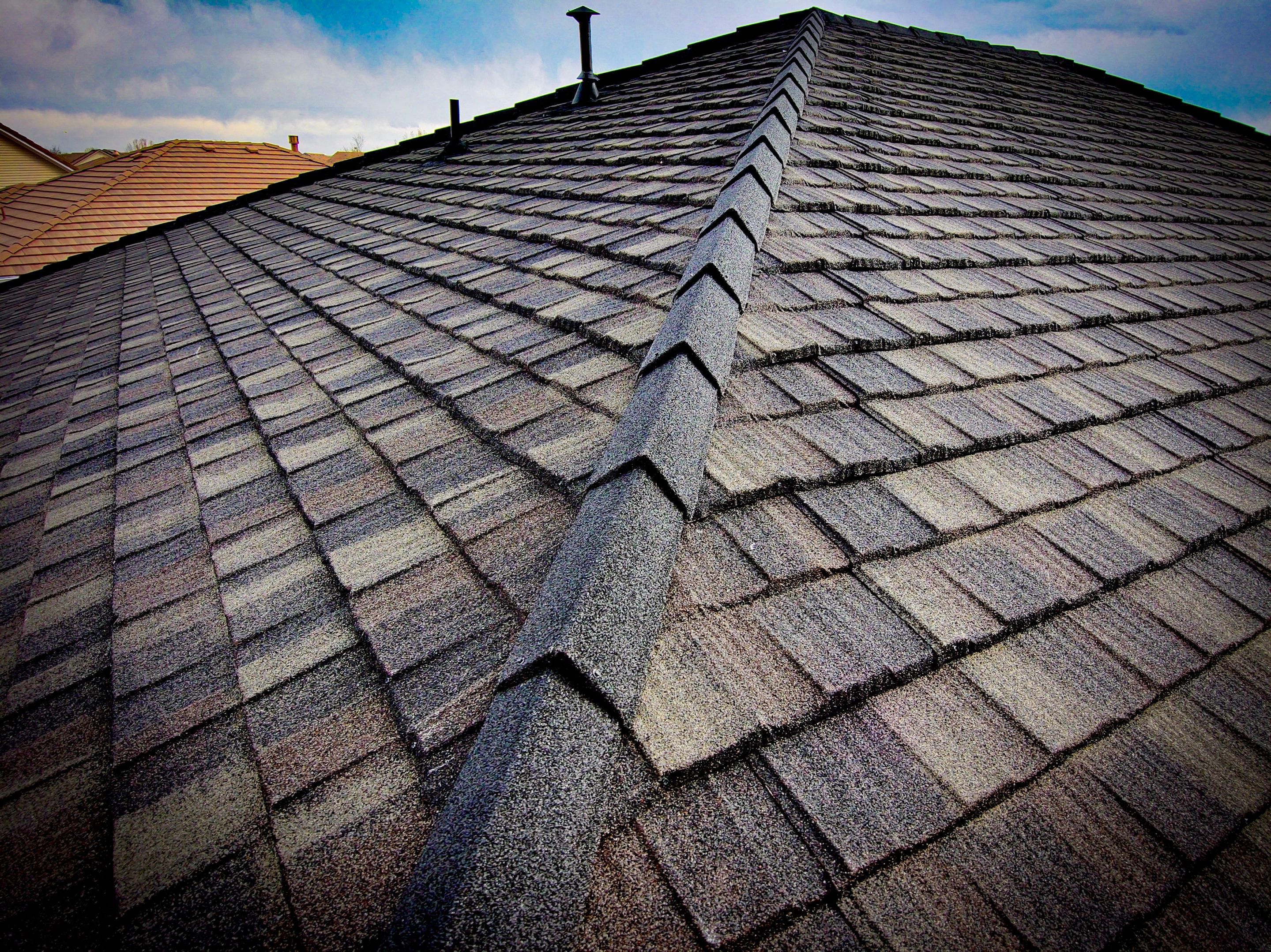 Residential Roofing Installation using Stone Coated Steel Cottage Shake by Blue Peaks Roofing LLC 