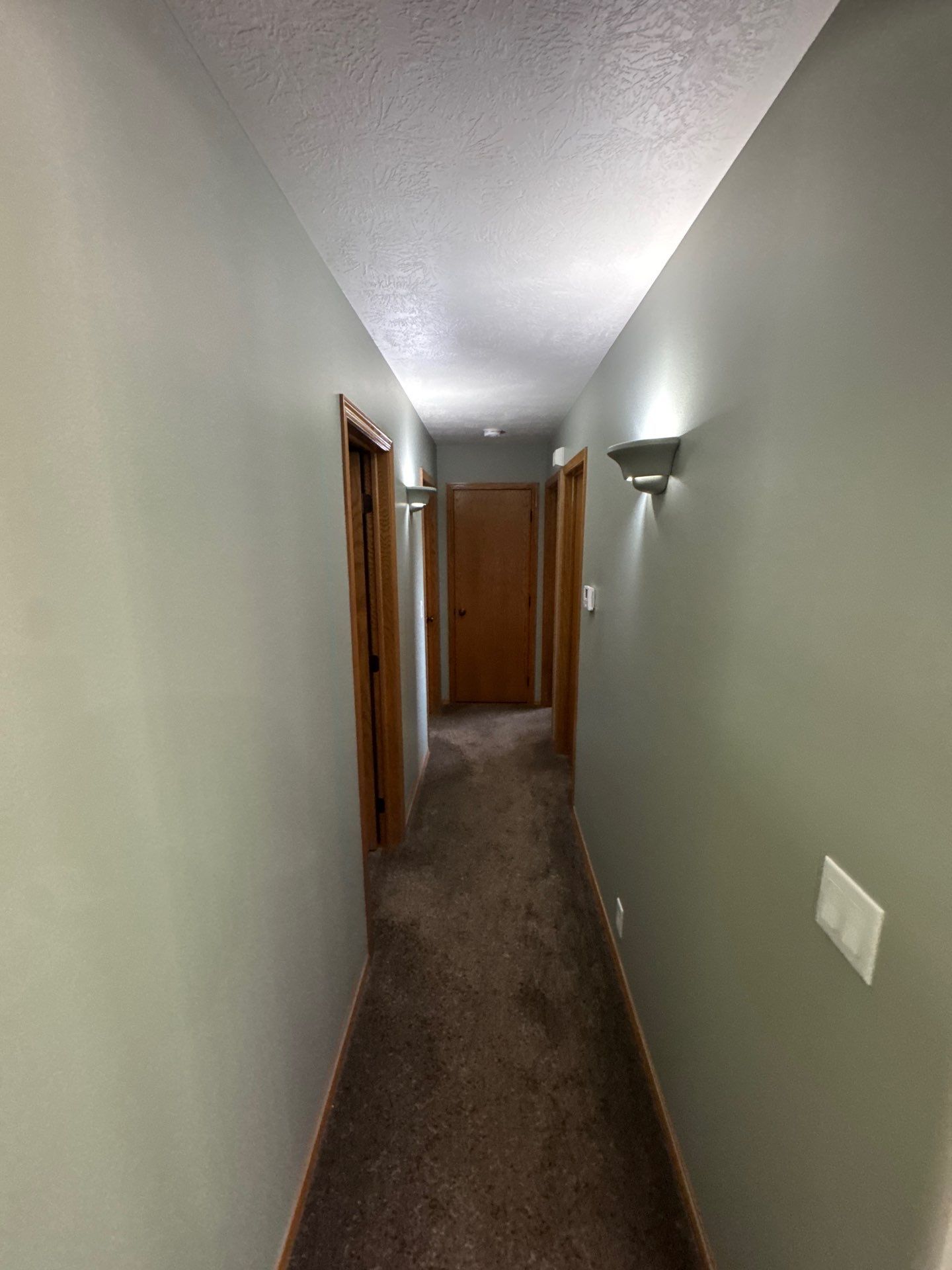 Interior Painting Update for a Multi-Level Sioux Falls Home by Select Painting, Coatings & Garage Cabinets