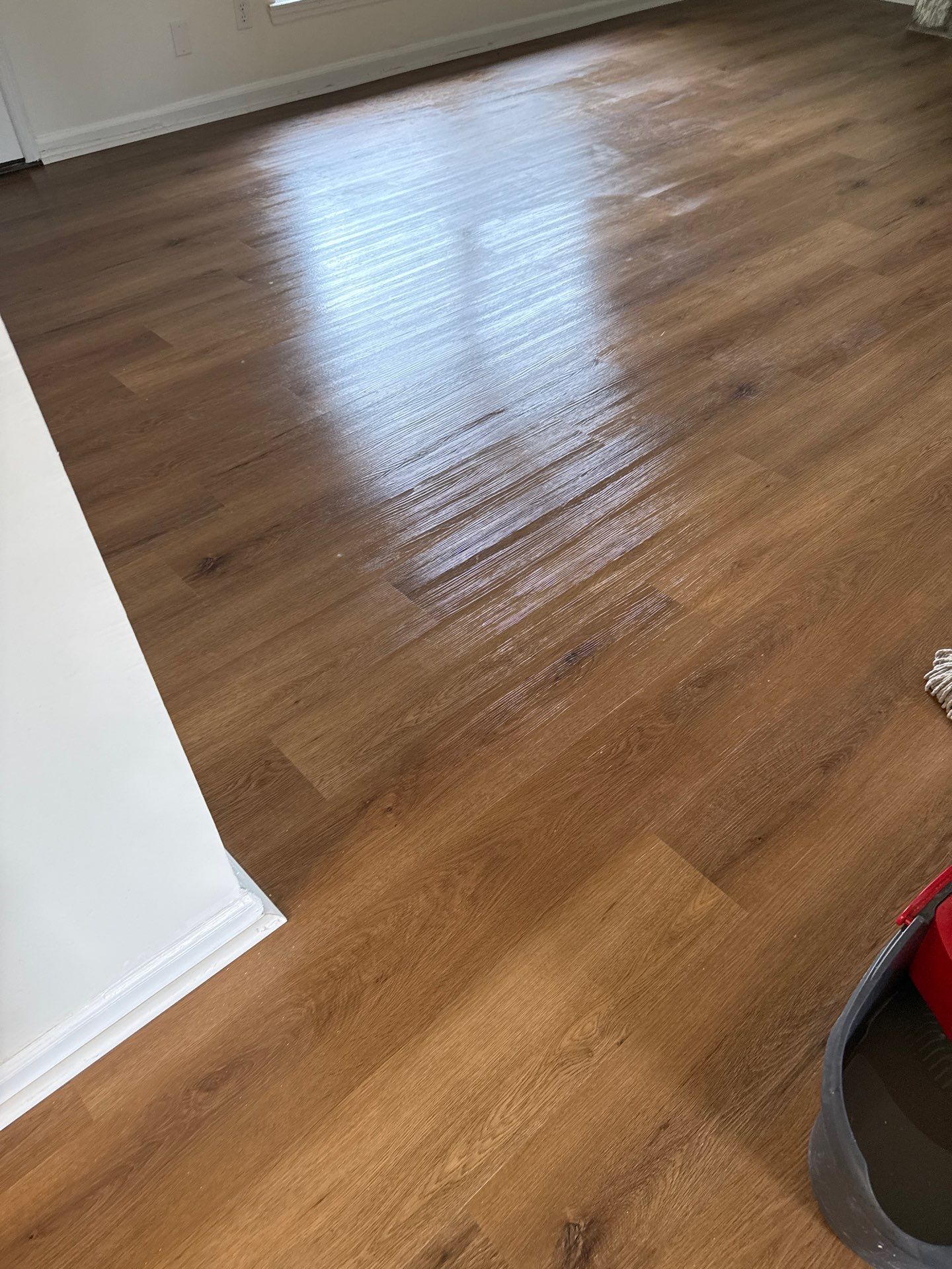 Complete Home Remodel Featuring Custom Kitchen and Wood-Look Plank Flooring by MAJO