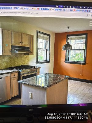 Lincoln Kitchen Remodel Featuring Natural Wood Cabinetry and Granite