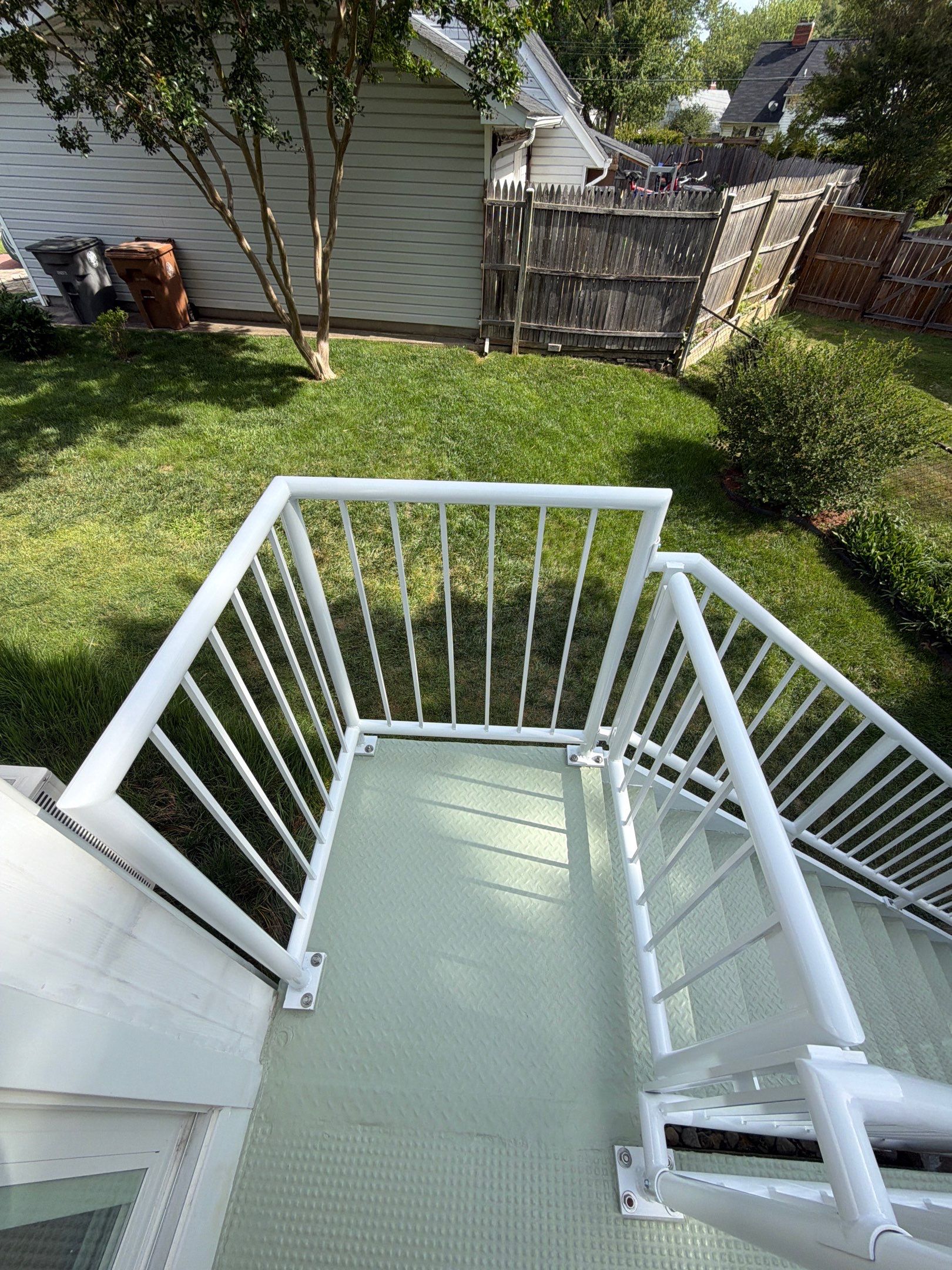 White Powder-Coated Outdoor Railings in Rockville & Staircase and Deck Refurbishment  by Capitol Iron Works