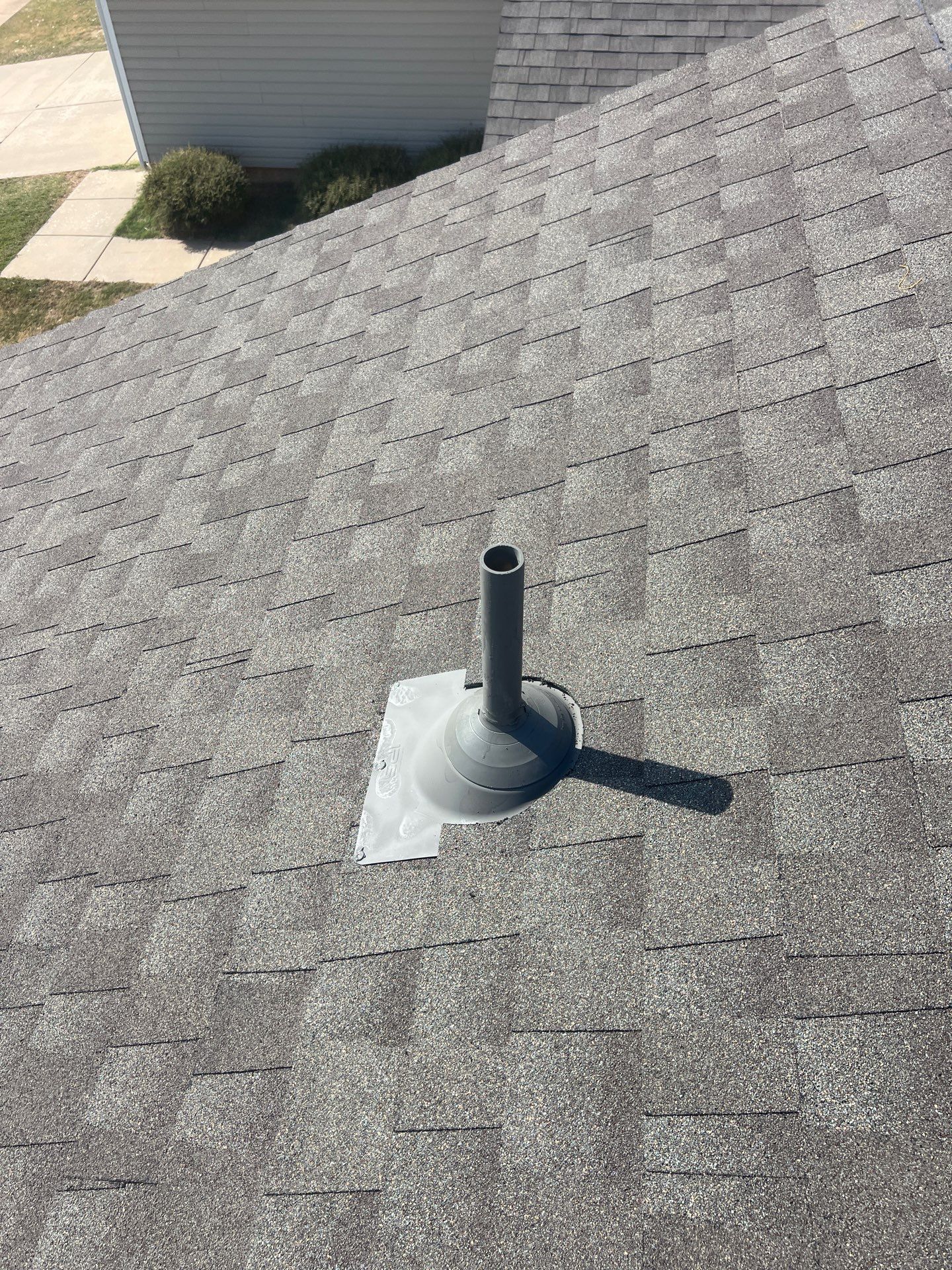 Roof Replacement and Gutter Installation in Edmond, OK by McCann's Roofing and Construction