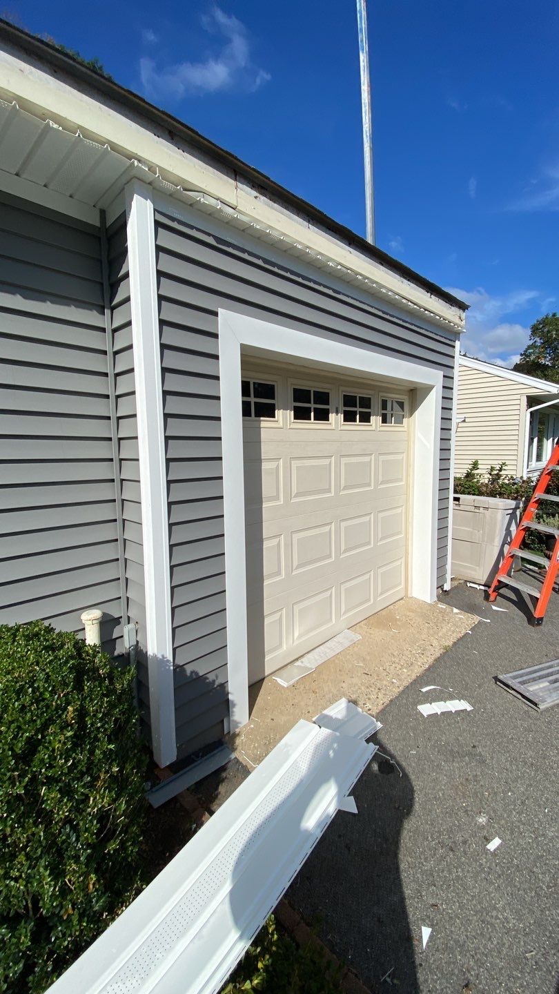 Siding Installation using CertainTeed monogram 4" double 4 Charcoal Gray by A Plus Exterior