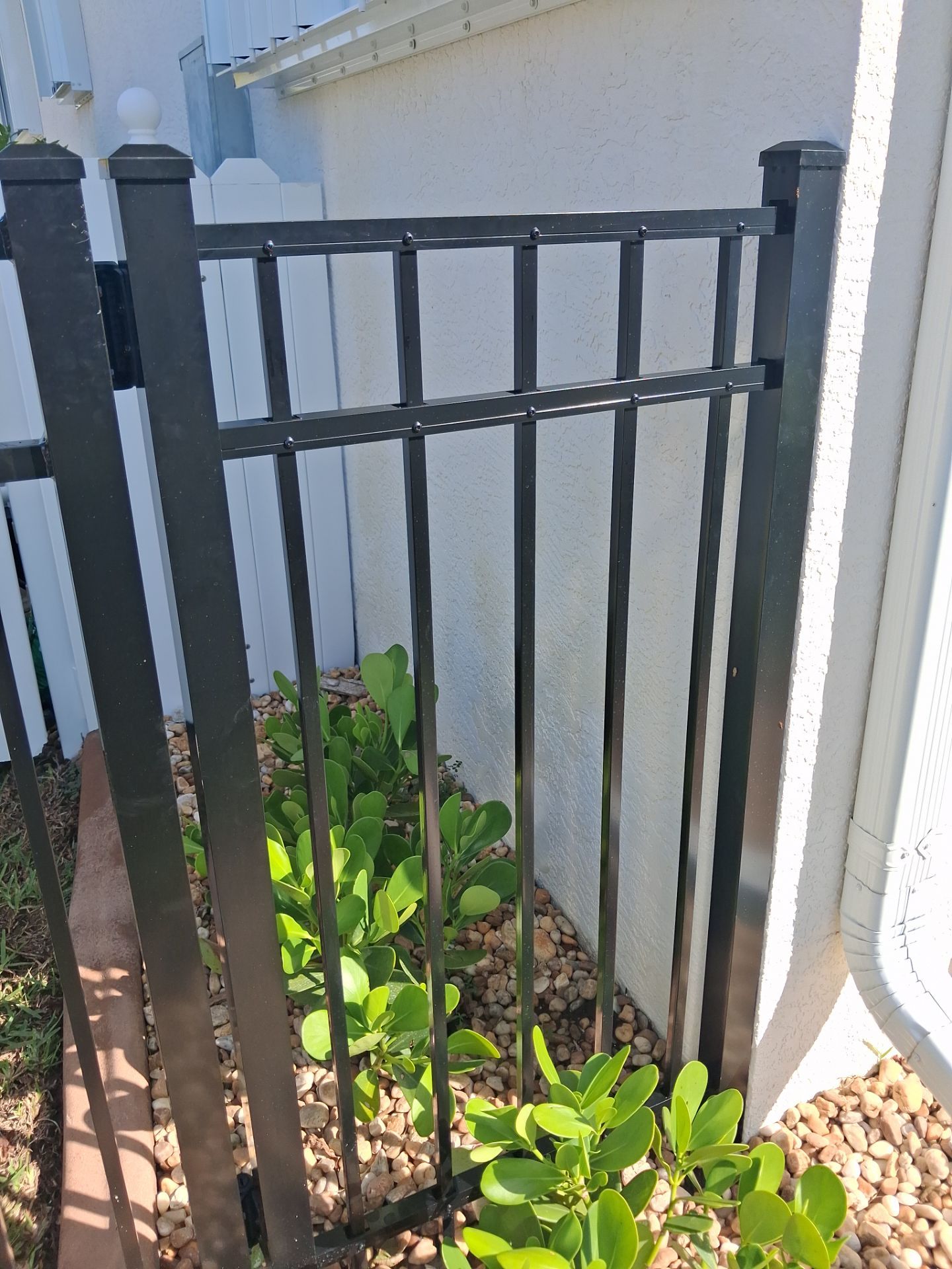 Custom Black Aluminum Fence Enclosure for Punta Gorda Waterfront Property by True Fence LLC