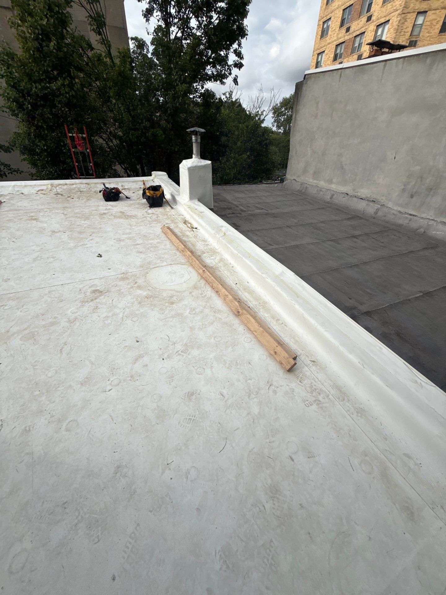 Roof Replacement and Custom Trex Roof Top Deck Project in Philadelphia, Pennsylvania by Philadelphia Quality Roofing