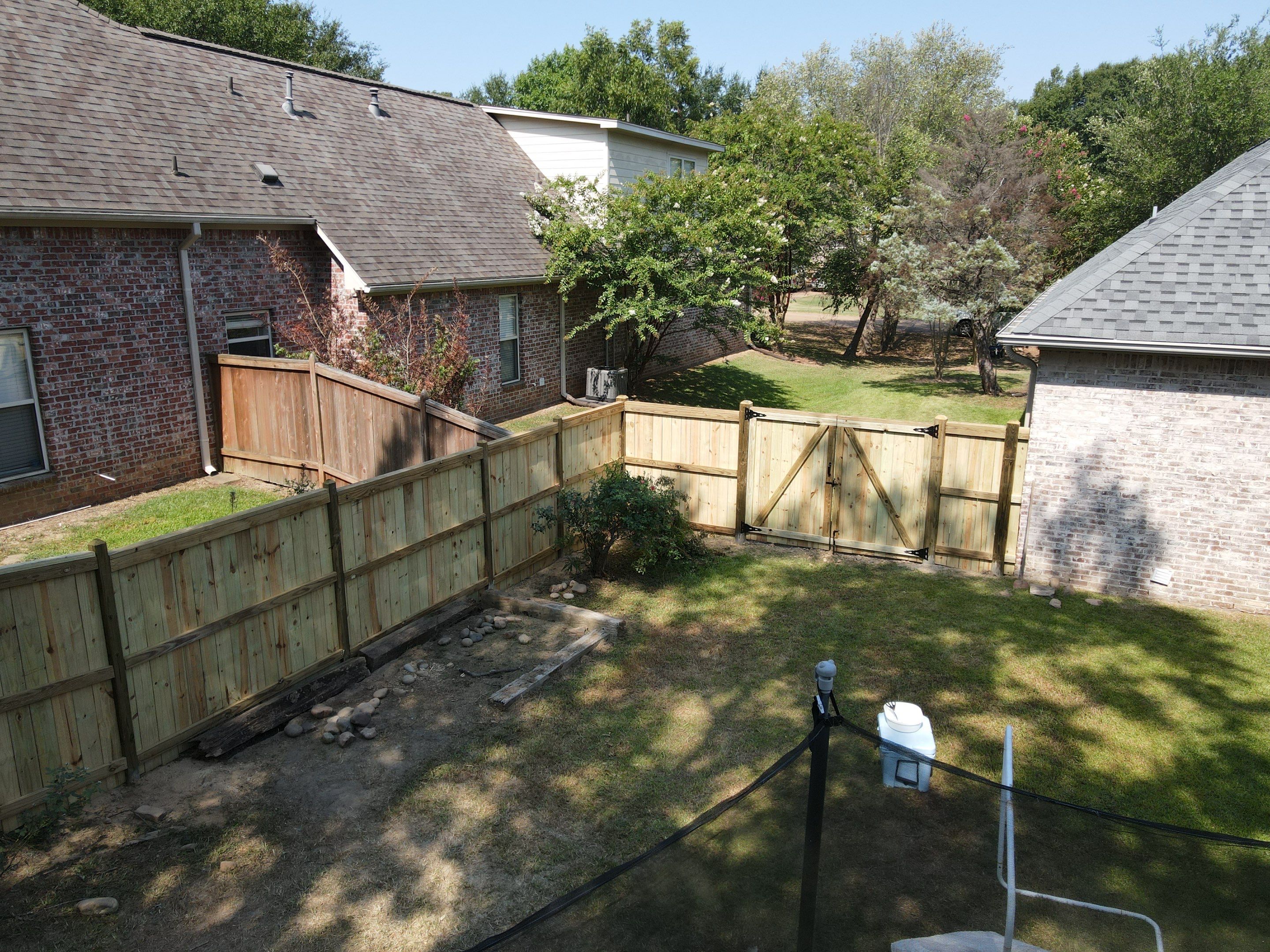 6ft Treated Pine Good Neighbor Fence by Roberson Construction LLC