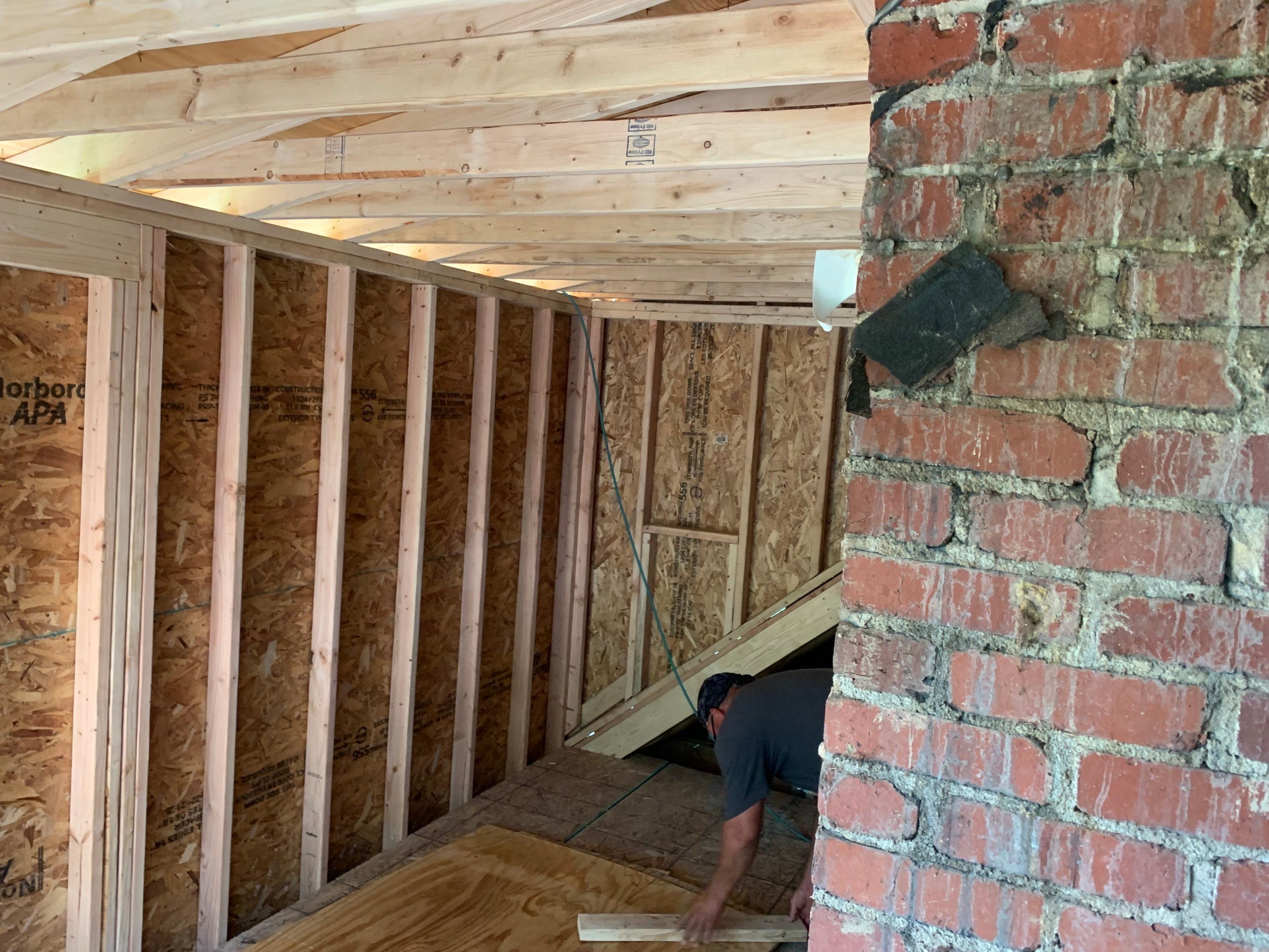 Room addition on the second floor of house by Greenspring Construction Services