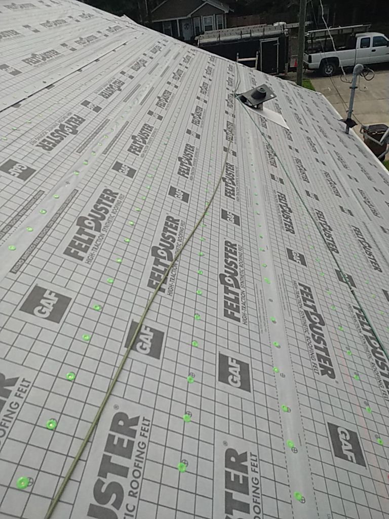 Residential Roofing Installation using Roof Replacement by American Roofing & Construction LLC