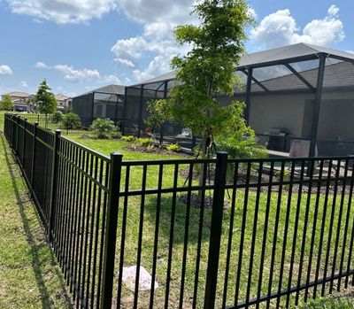 Aluminum Fence Installation using Black 3 Rail Aluminum Fence