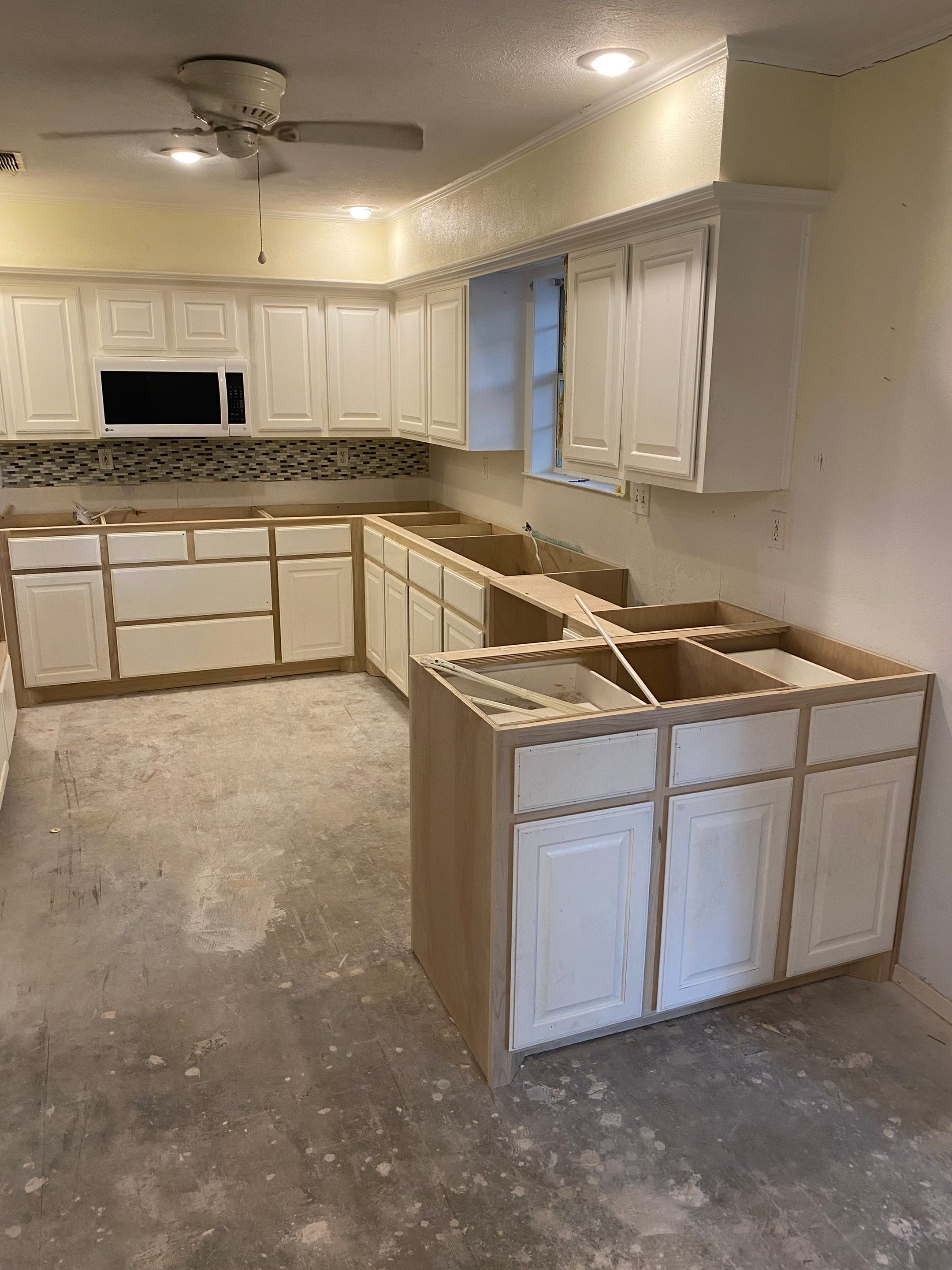 Home Remodel after Huge Water Damage by L&T General Contractors and Restoration INC