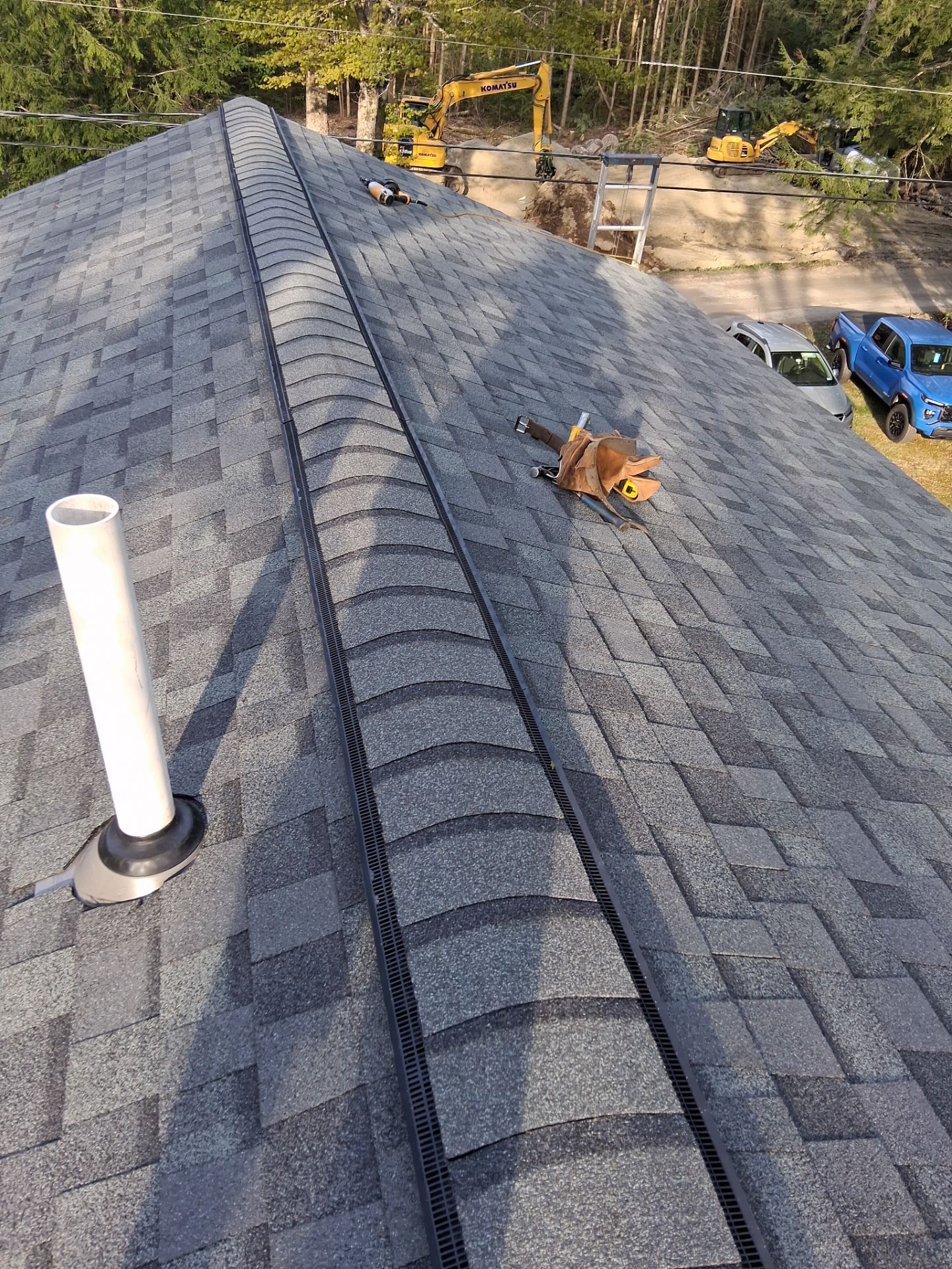 Asphalt Shingle Roof Replacement and Skylight Installation in Newport, NH by Tall pine roofing