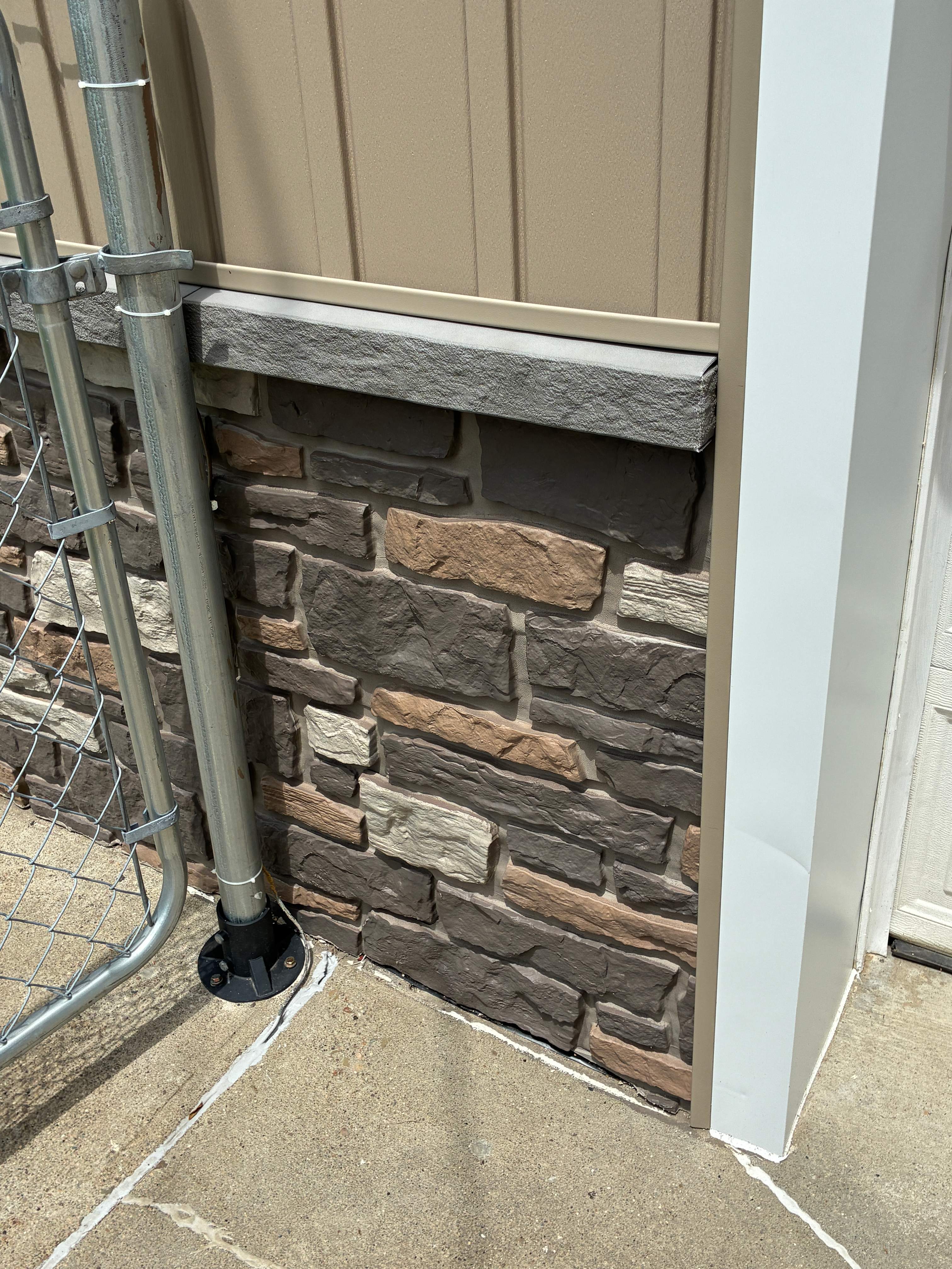 Jefferson Hills Vertical Board and Batten Siding and TandoStone Renovation by Ideal Siding Pittsburgh
