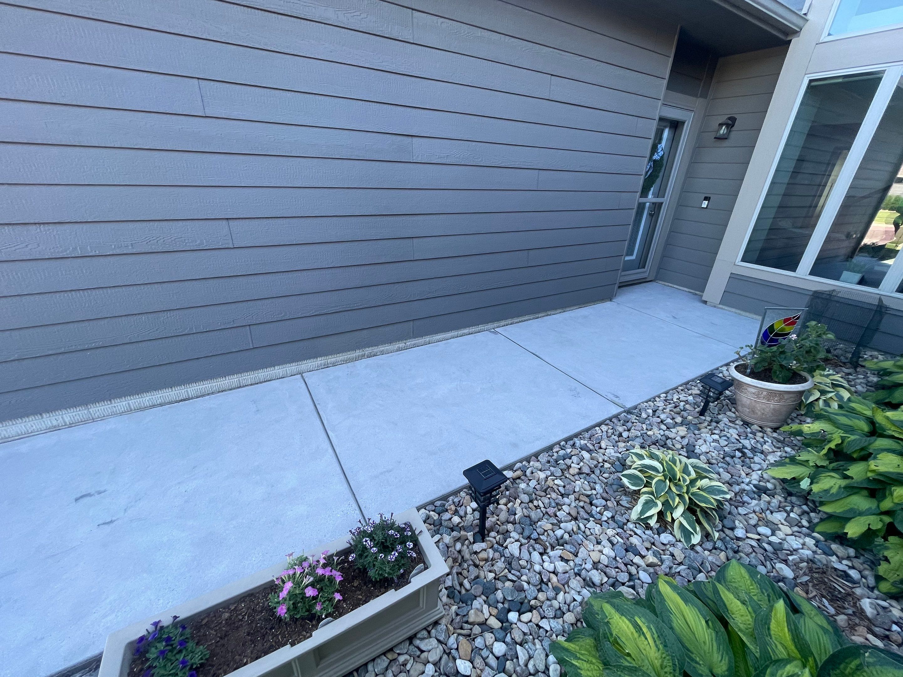 Custom Concrete Coating for Sioux Falls Patio and Front Walkway by Select Painting, Coatings & Garage Cabinets