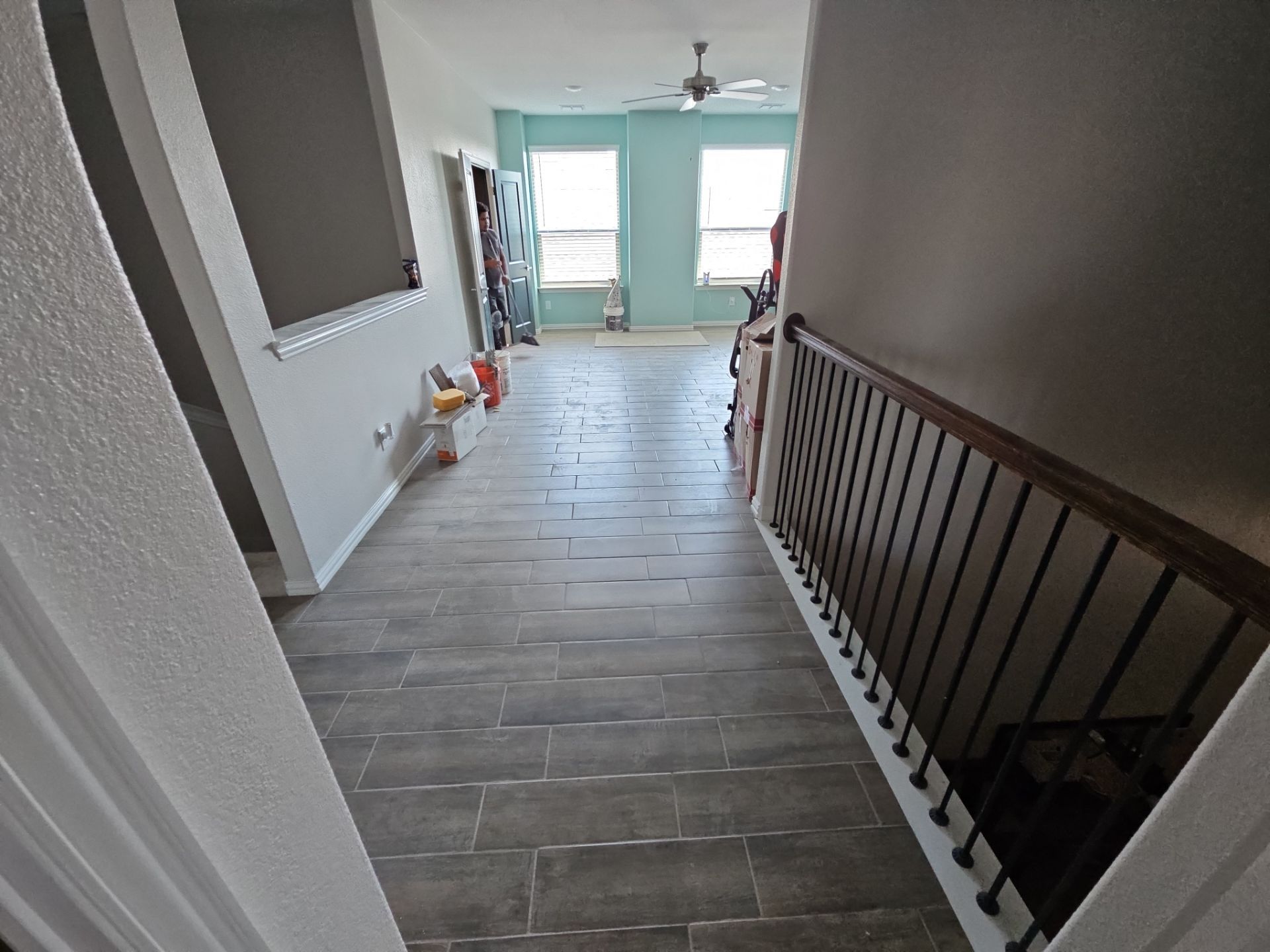 Carpet replacement with Tile and Red Oak Stairs by EL-GC LLC 