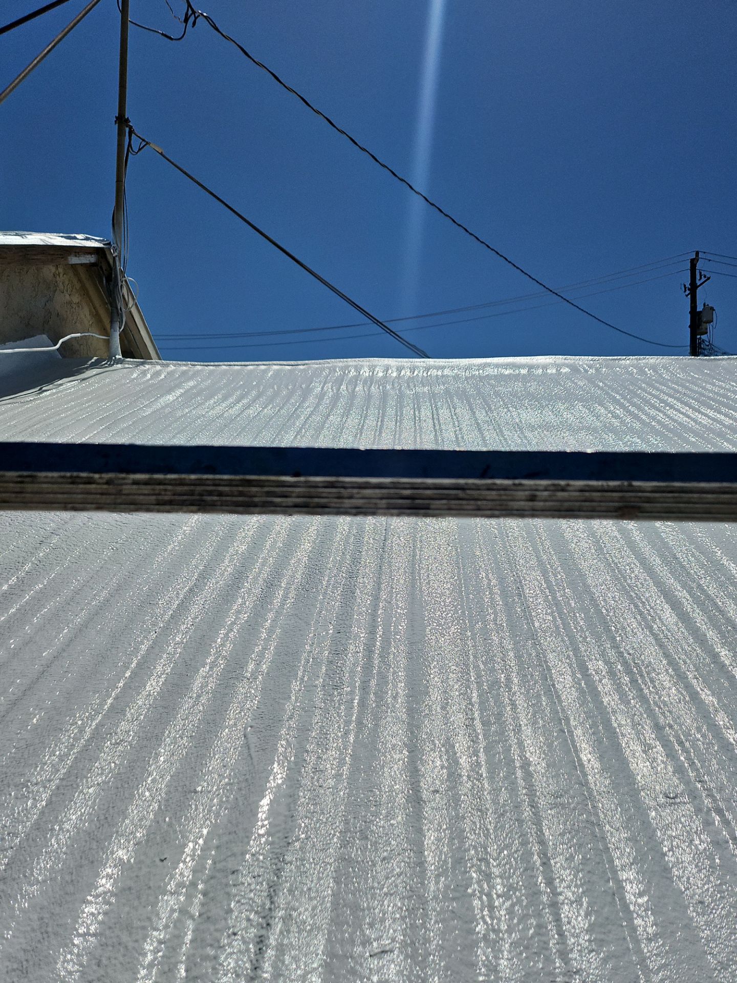 Spray foam and coatings using Conklin Benchmark/PUMA XL by Straight Edge Roofing Inc