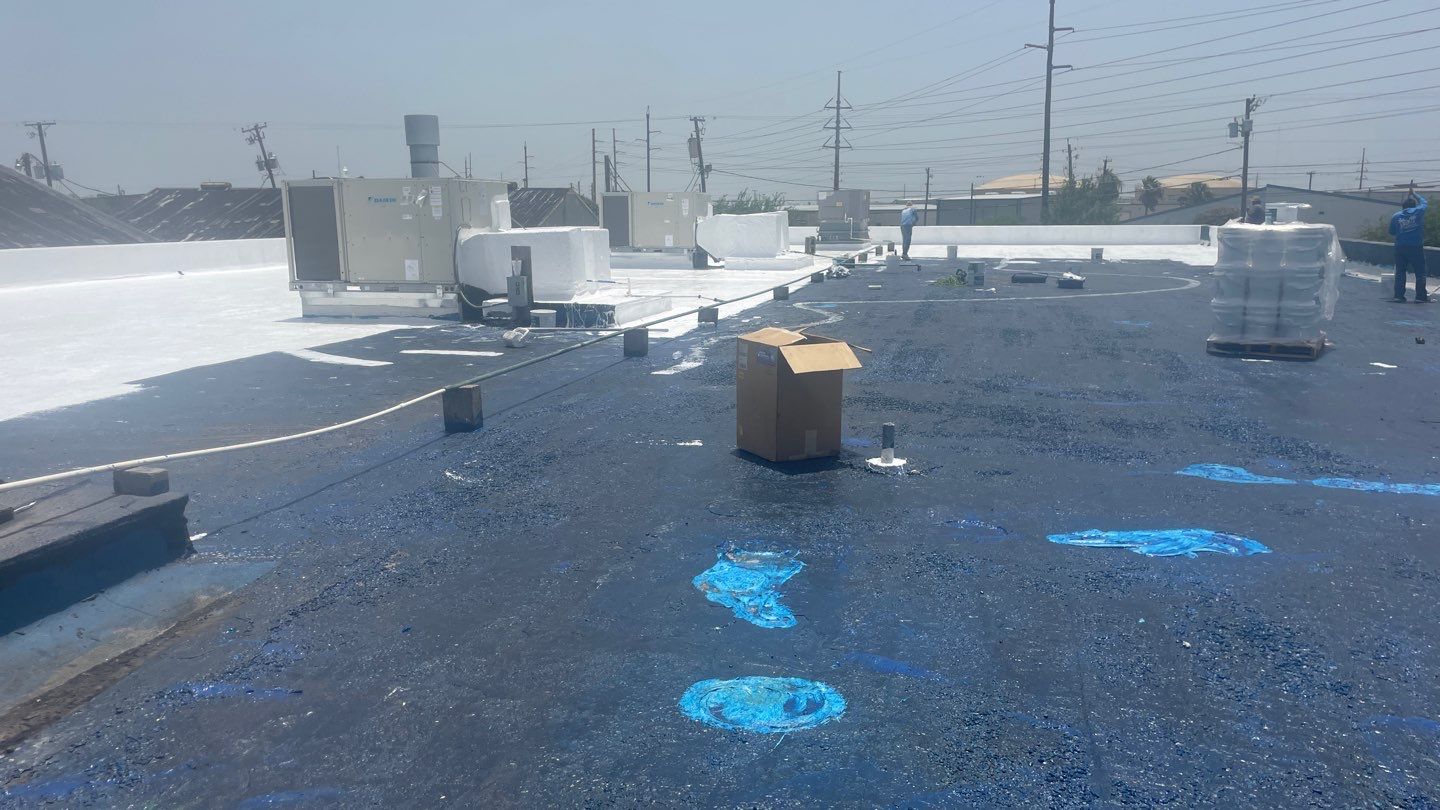 Dirty leaking Gravel Roof by Bayfront Roofing and Construction